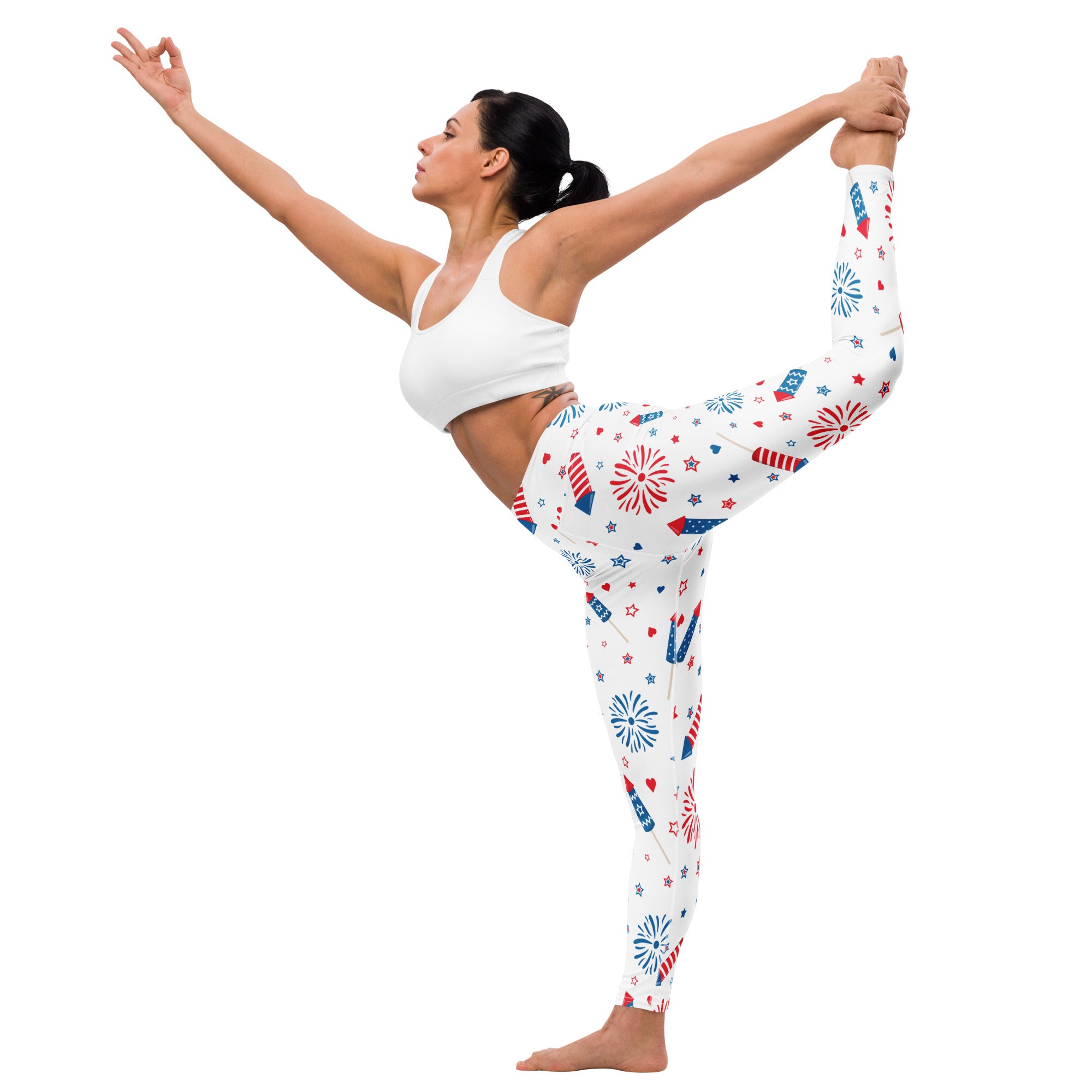 Women’s white buttery soft yoga leggings with red white and blue fireworks and star patterns for festive wear