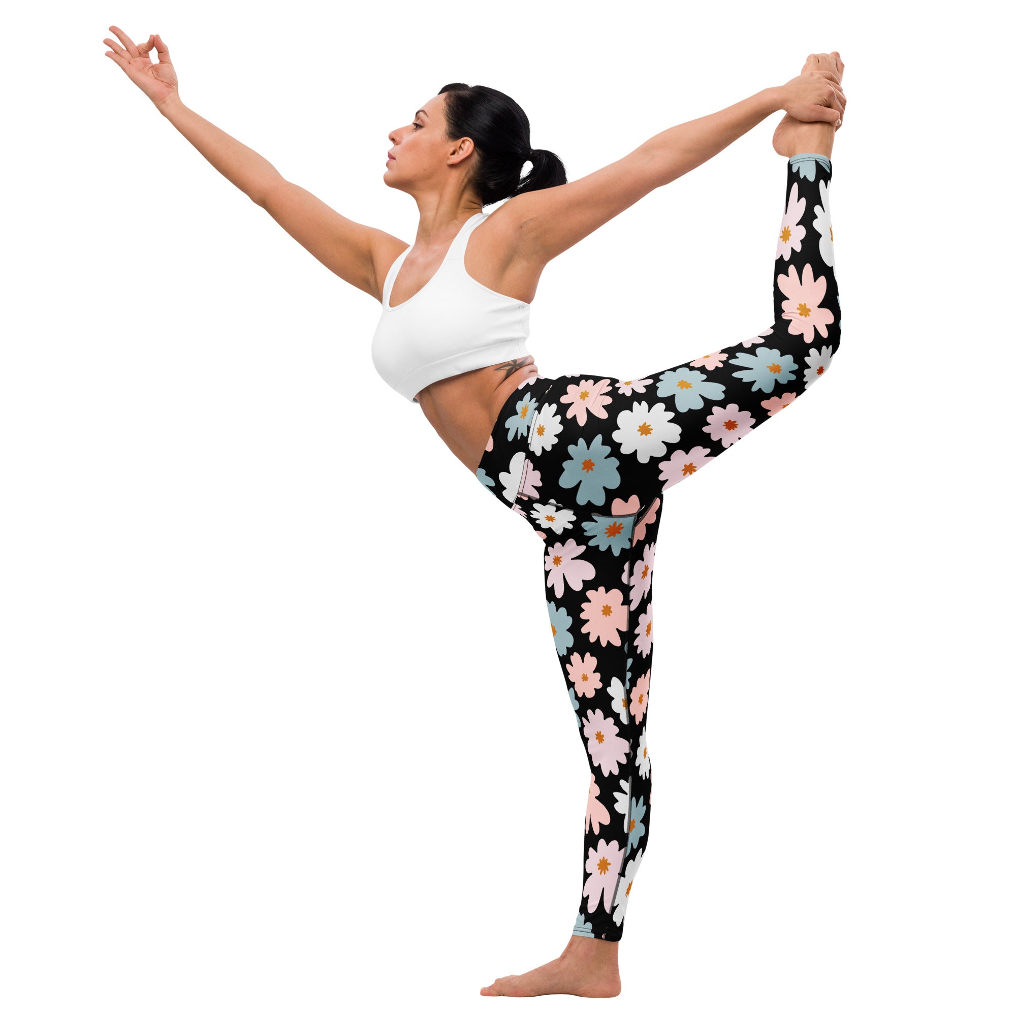 Women’s retro floral buttery soft yoga leggings in black with vibrant pink white and blue daisy pattern