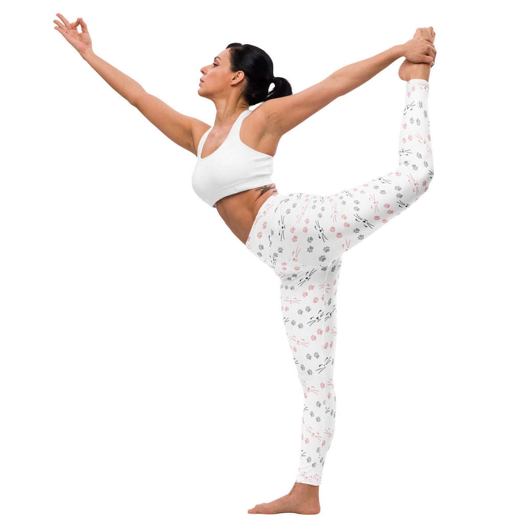 Women’s buttery soft white yoga leggings with delicate pink and gray floral cat paw print pattern
