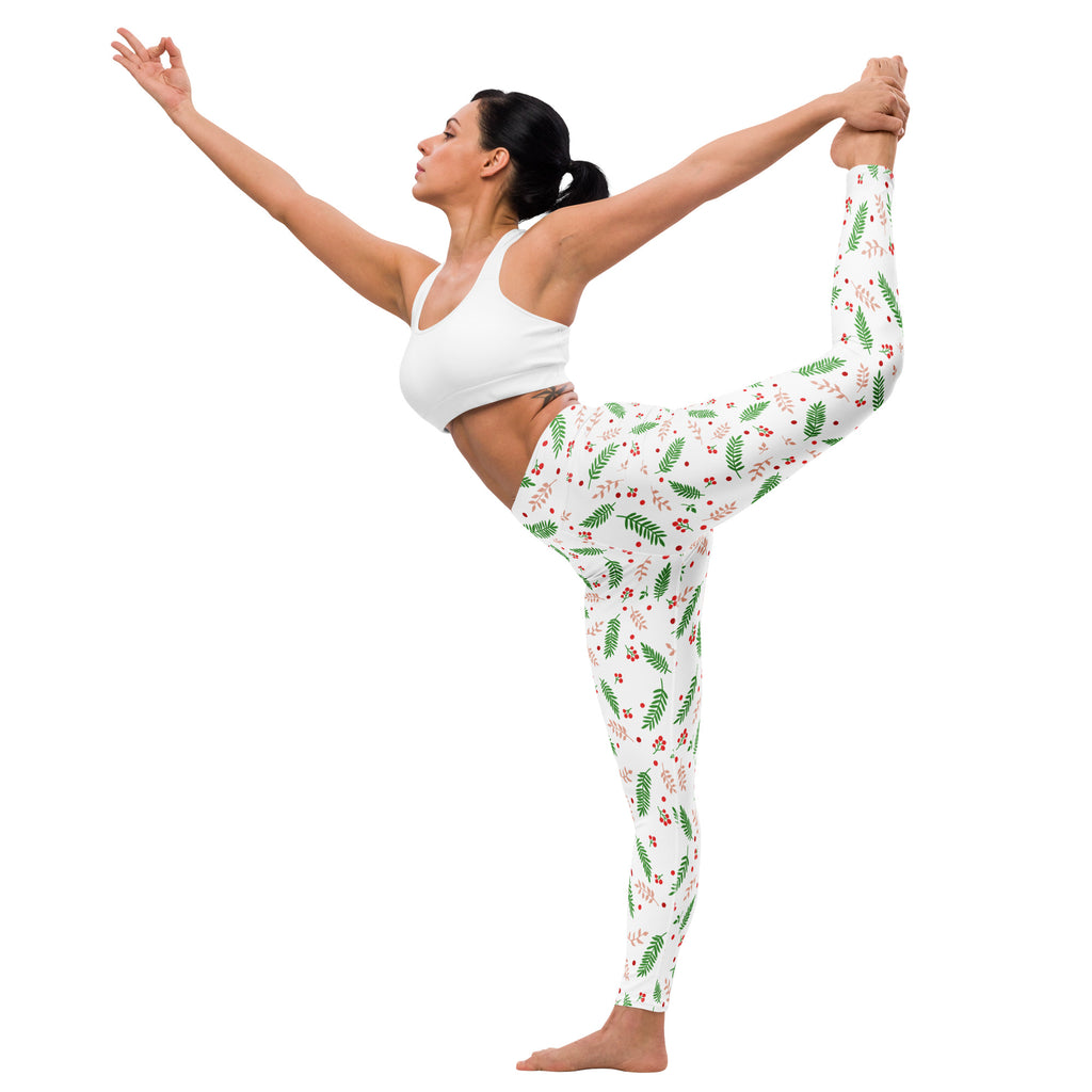 White women’s winter berry buttery soft yoga leggings with green fern and red berry pattern