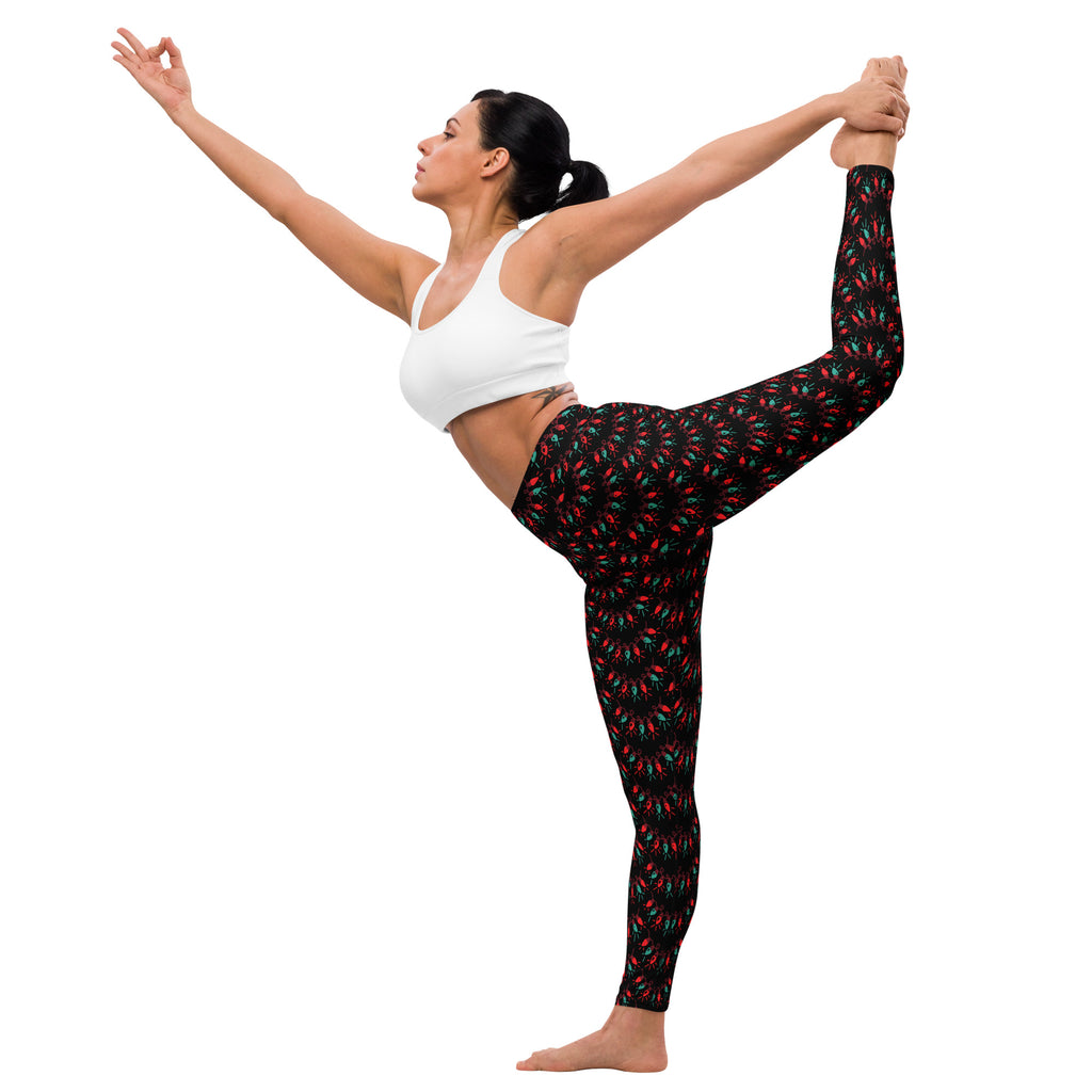 Women’s buttery soft black yoga leggings with vibrant red and green chili pepper pattern perfect for christmas wear