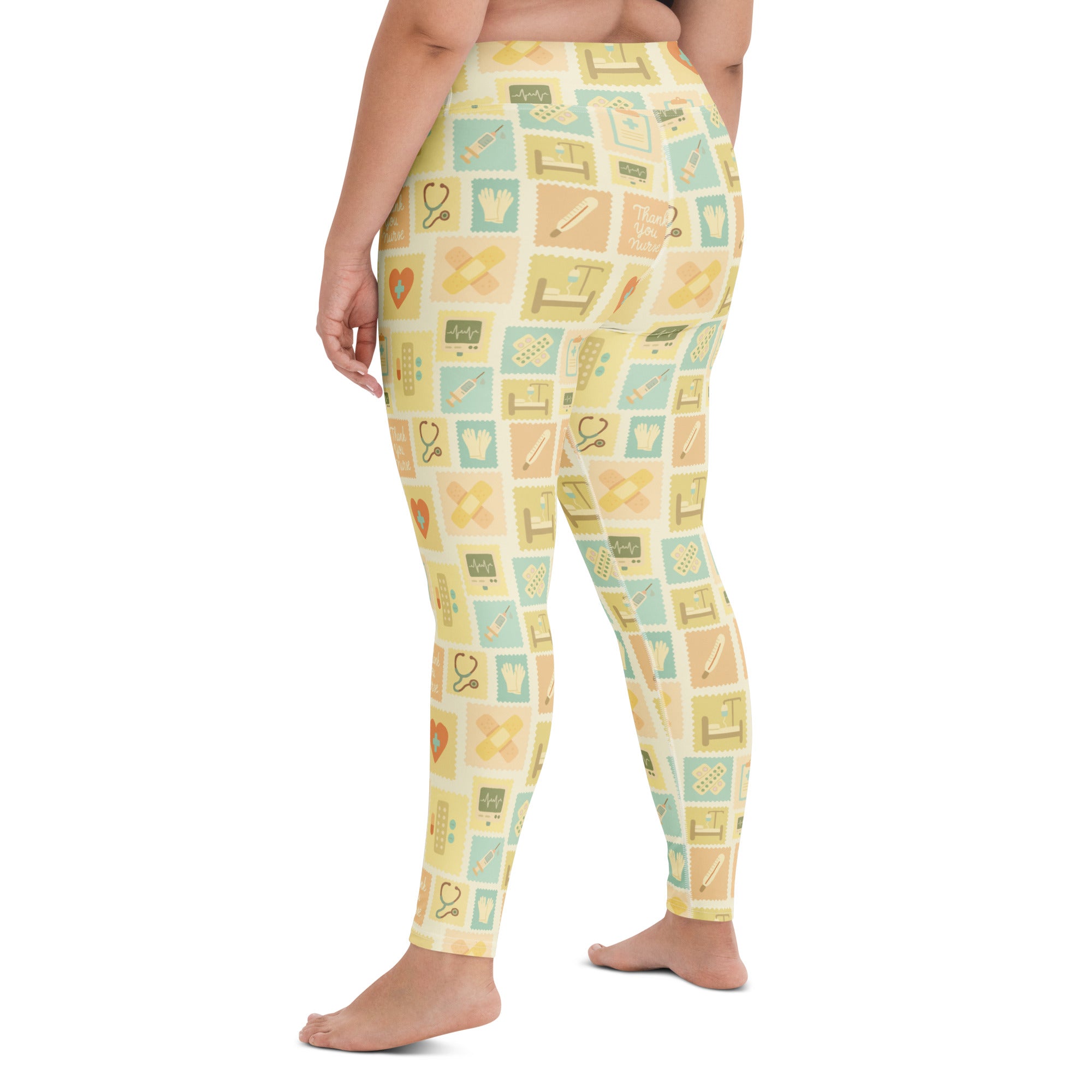 Women’s beige buttery soft high waisted yoga leggings with yellow medical icon pattern and quick drying fabric