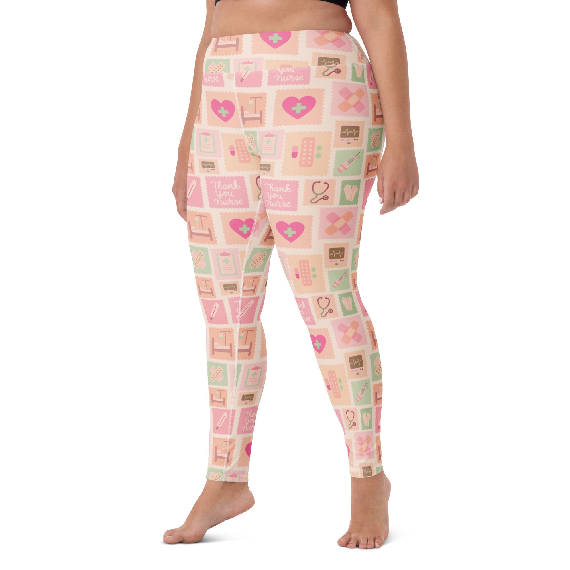 Women’s pink nurse icon buttery soft yoga leggings with pastel pink and mint green medical pattern for high waist comfort
