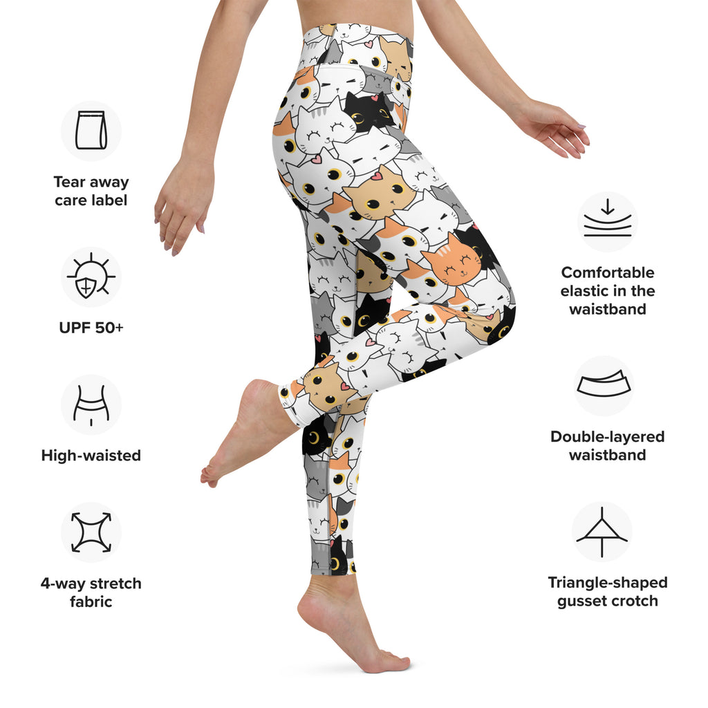 Women’s white buttery soft yoga leggings with a playful black white and orange cartoon cat face pattern