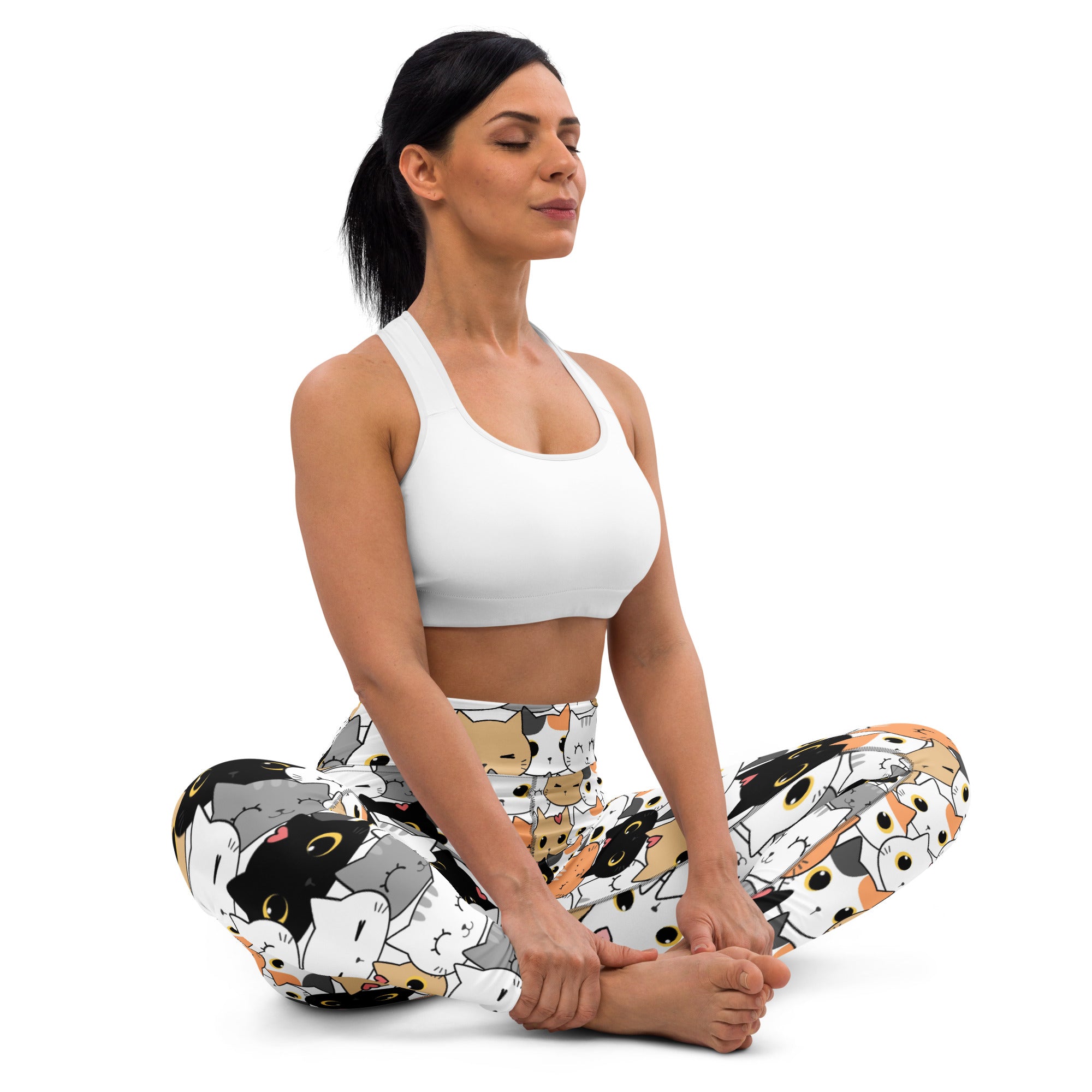 Women’s white and multicolored cat face yoga leggings made from buttery soft fabric perfect for workouts