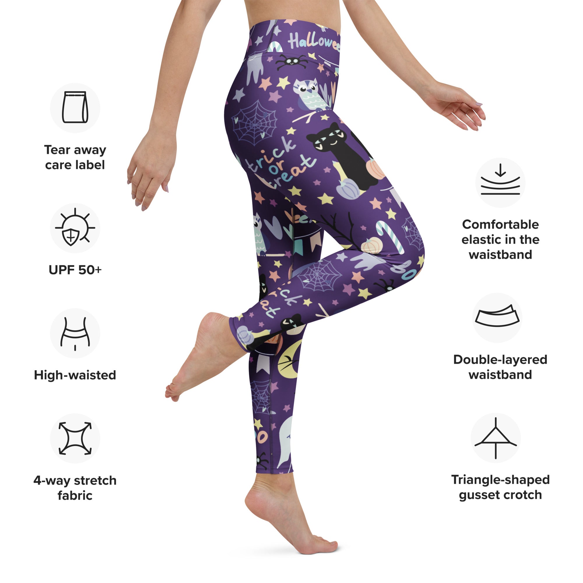 Women’s spooky halloween buttery soft yoga leggings in purple with black cats ghosts and stars on stretchy fabric