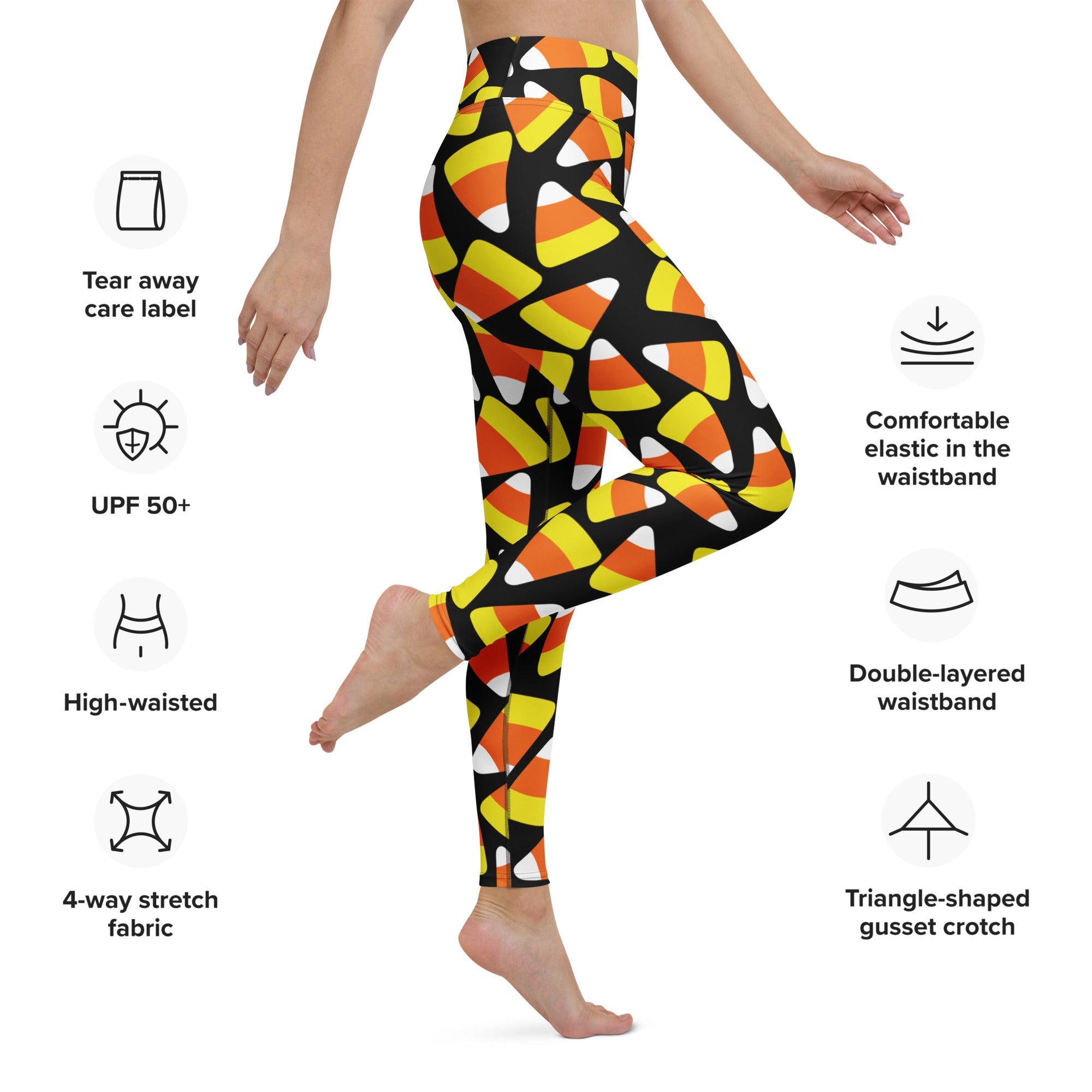 High-waisted women’s candy corn halloween buttery soft yoga leggings with vibrant orange yellow and white pattern on black