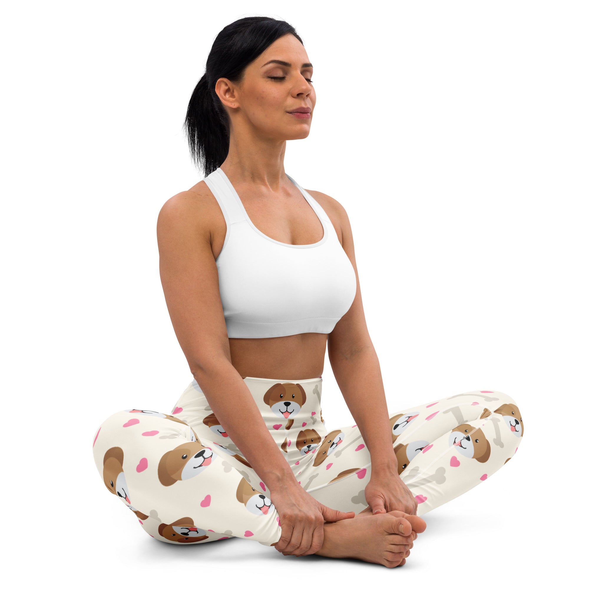 White buttery soft women’s yoga leggings with playful brown dog faces and pink hearts pattern