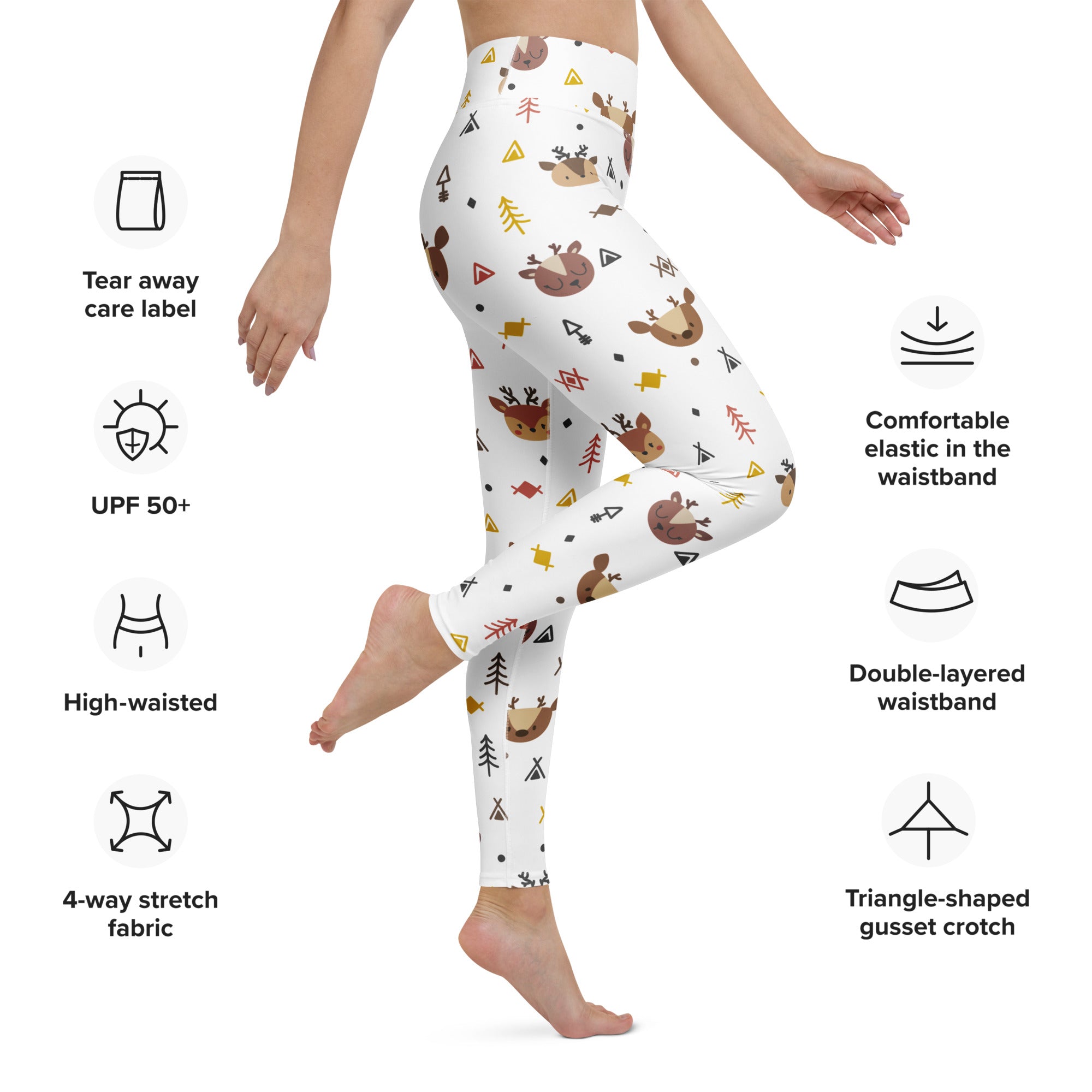 White buttery soft women’s yoga leggings with playful brown deer yellow triangles and green trees reindeer print