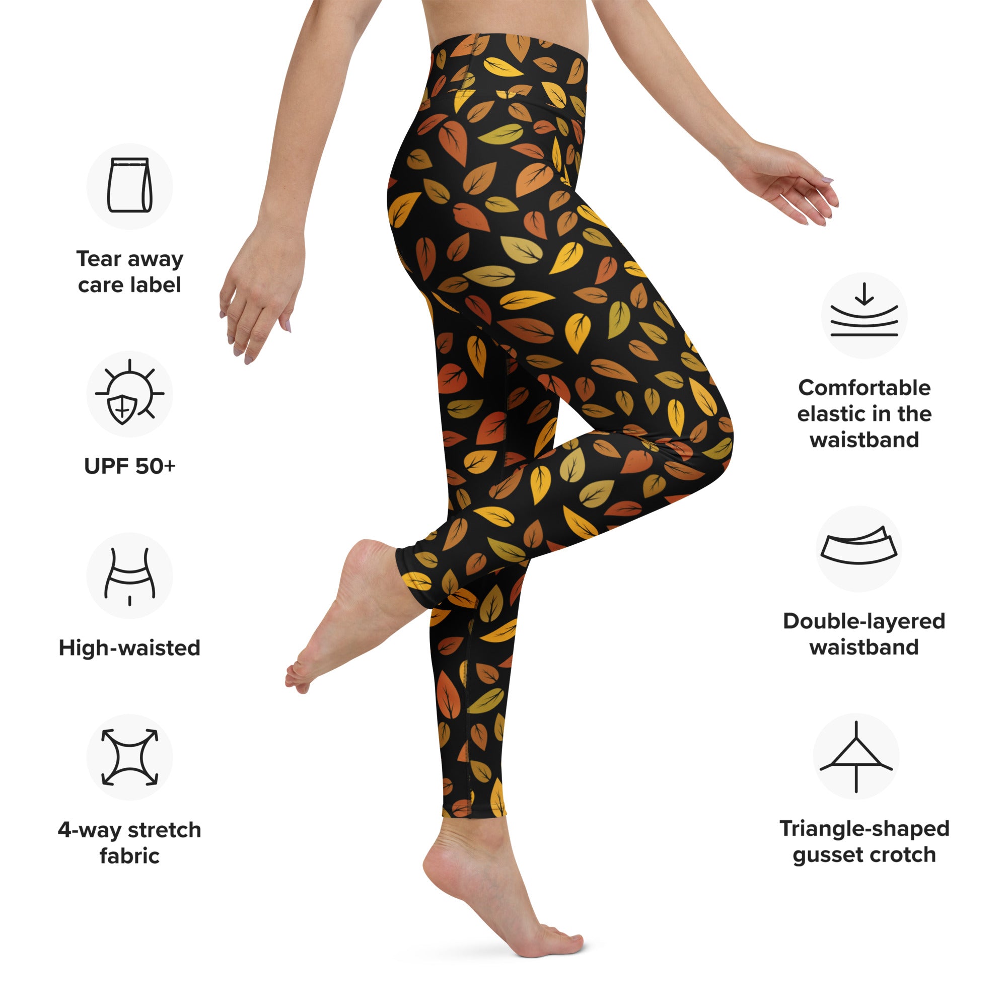 Women’s buttery soft black leggings with vibrant yellow and orange gold leaves pattern perfect for yoga