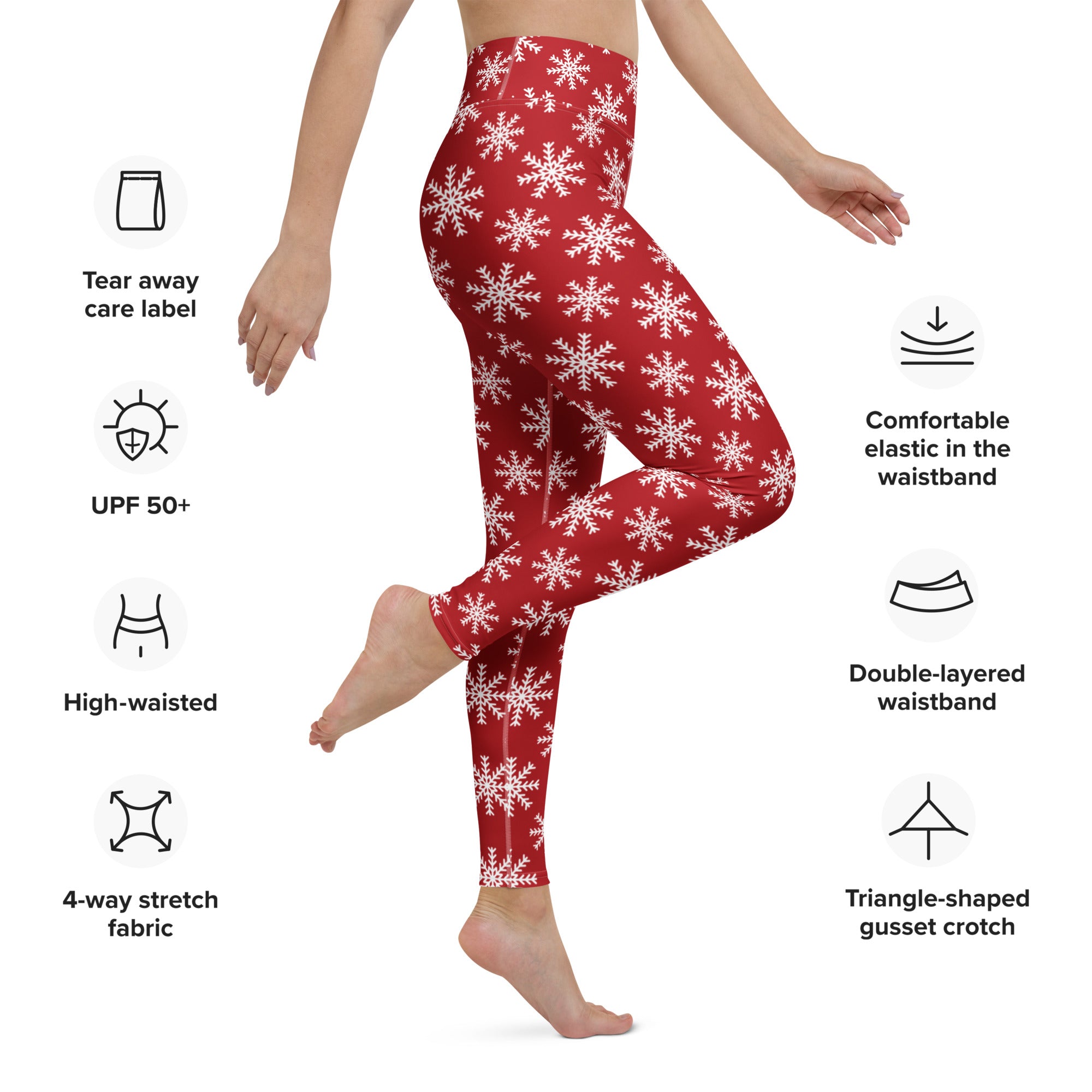 Women’s red snowflake buttery soft yoga leggings made from 4-way stretch fabric with a white snowflake pattern