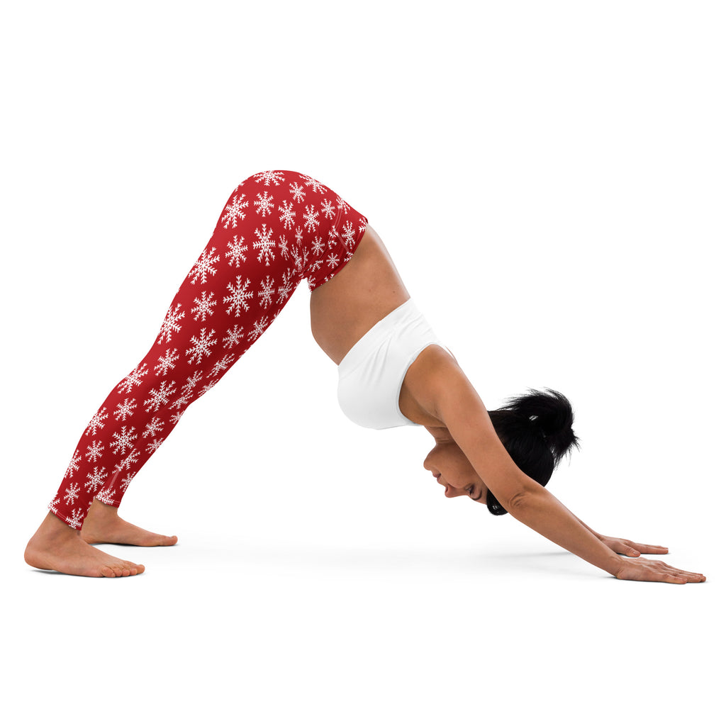 Women’s red buttery soft yoga leggings with white snowflake pattern perfect for winter workouts