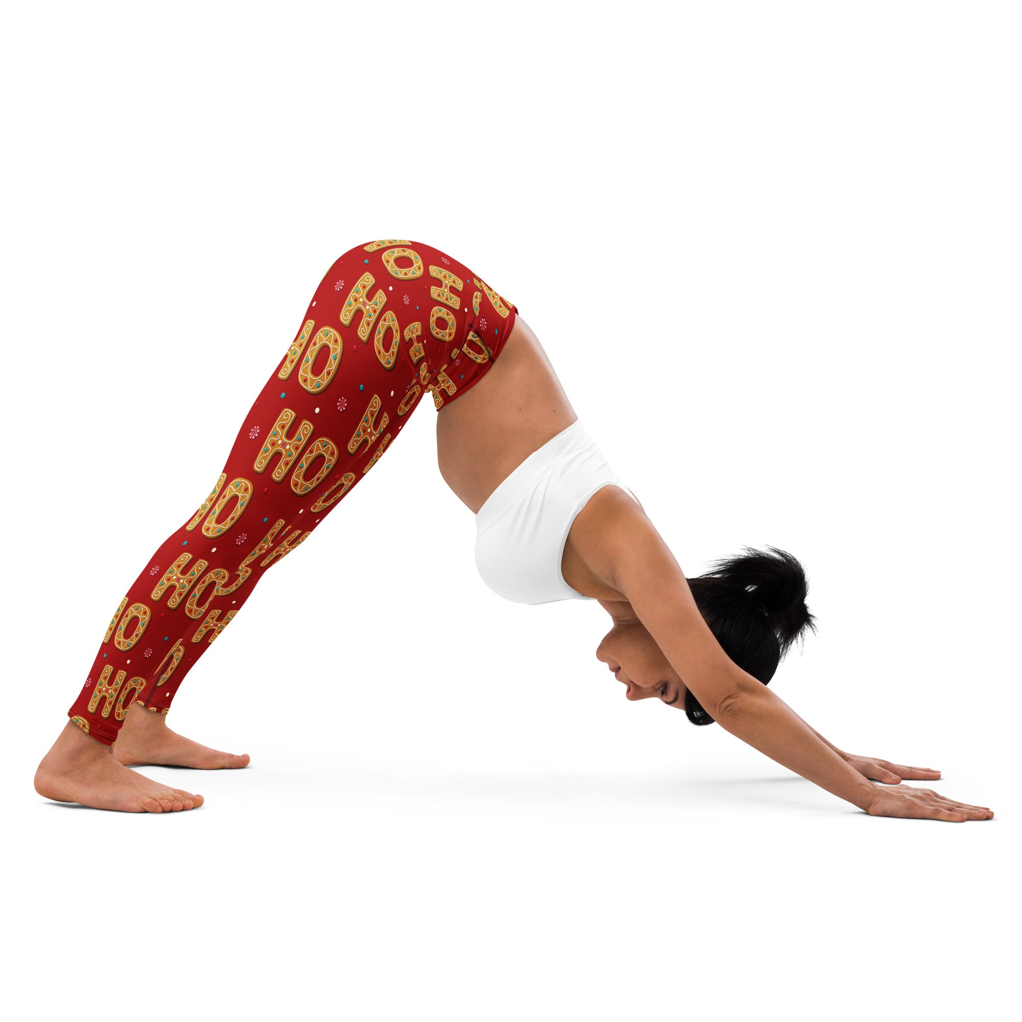 Women’s buttery soft red yoga leggings with festive gold ho ho ho pattern and small decorative accents