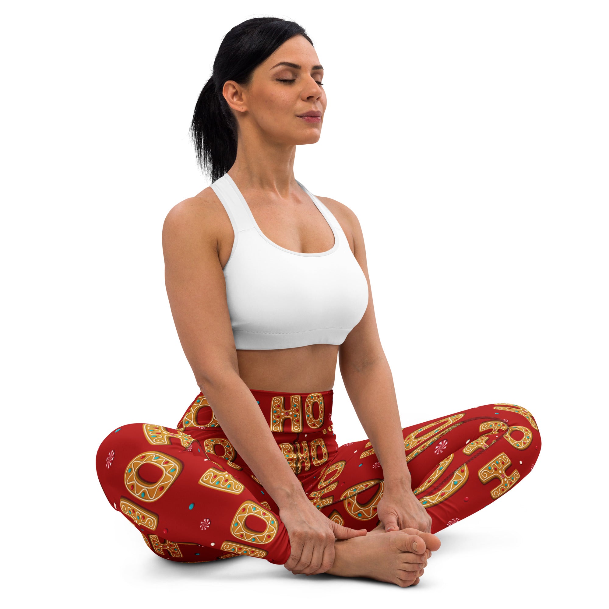 Women’s red buttery soft yoga leggings with festive gold and green ho ho ho gingerbread pattern