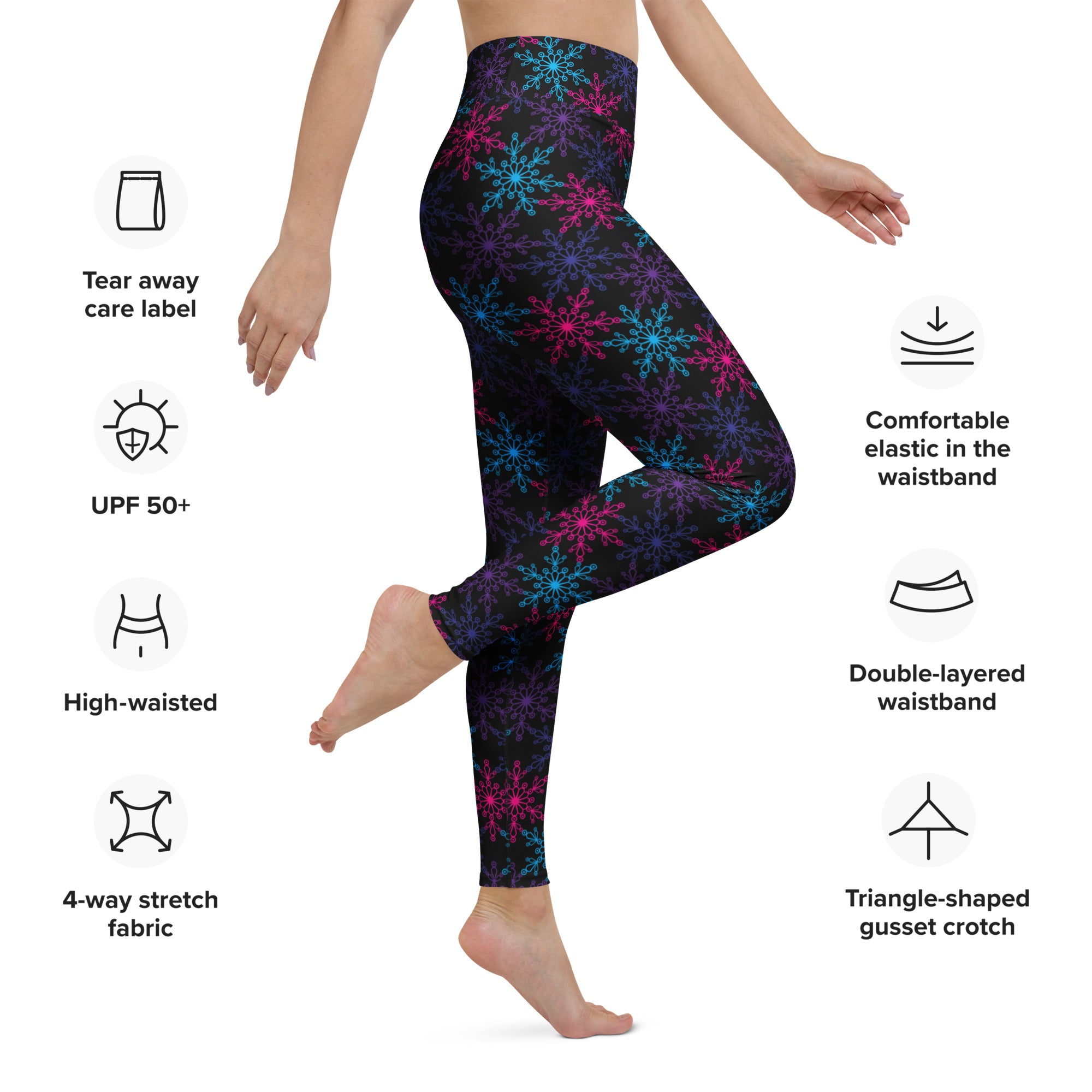 Women’s black buttery soft yoga leggings with vibrant blue and pink neon snowflake pattern for winter wear