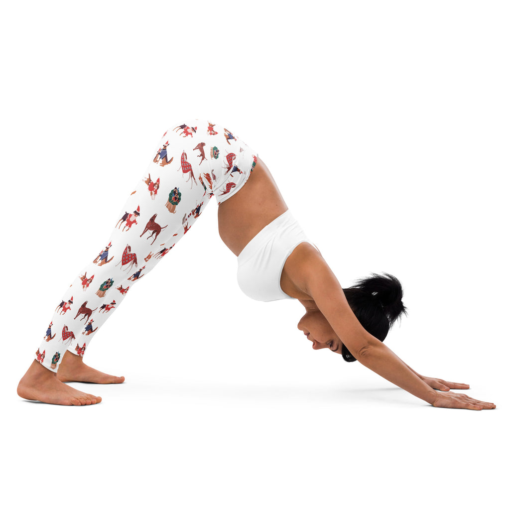 White buttery soft yoga leggings with playful red and brown horse pattern and festive holiday figures for women