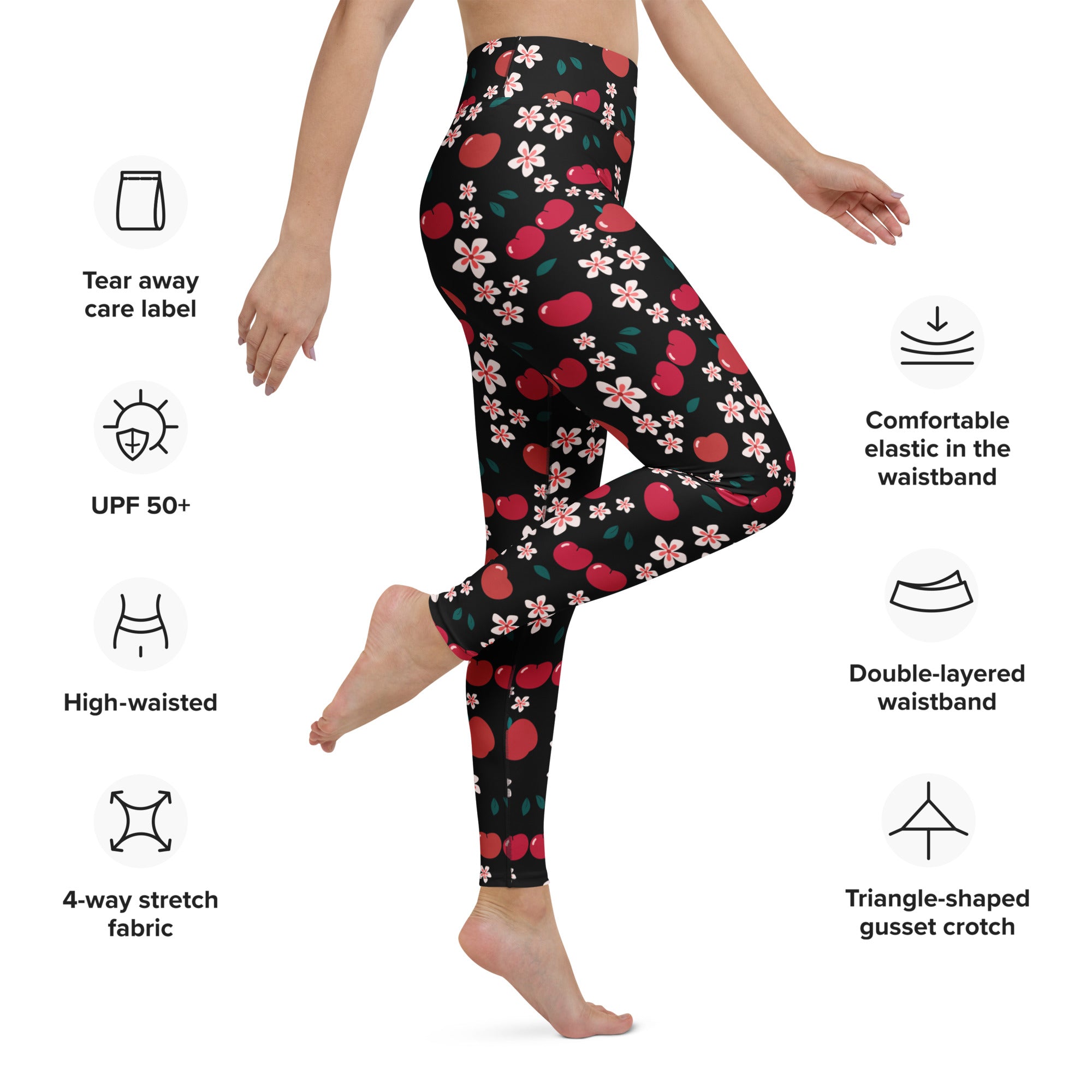 Black high-waisted women’s apple blossom buttery soft yoga leggings with a vibrant red cherry and pink flower pattern