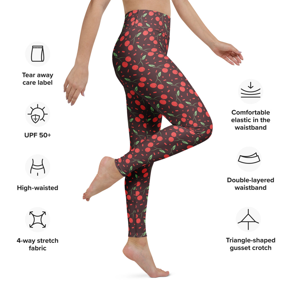 Women’s red cherry buttery soft high-waisted yoga leggings with dark base and green leaves pattern