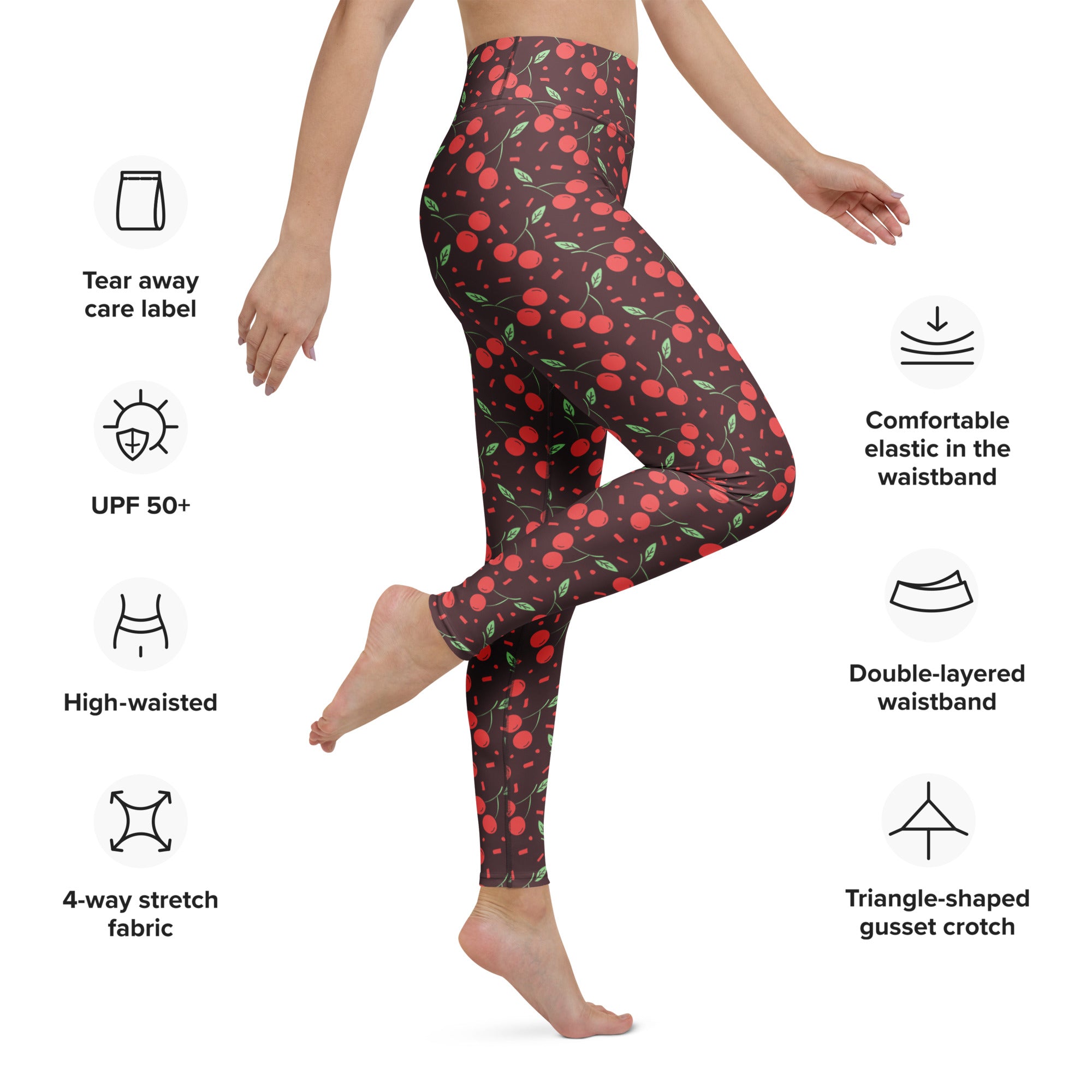 Women’s red cherry buttery soft high-waisted yoga leggings with dark base and green leaves pattern