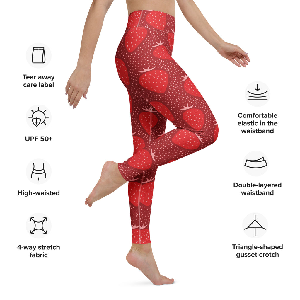 Women’s red strawberry-patterned high-waisted yoga leggings made of buttery soft 4-way stretch fabric