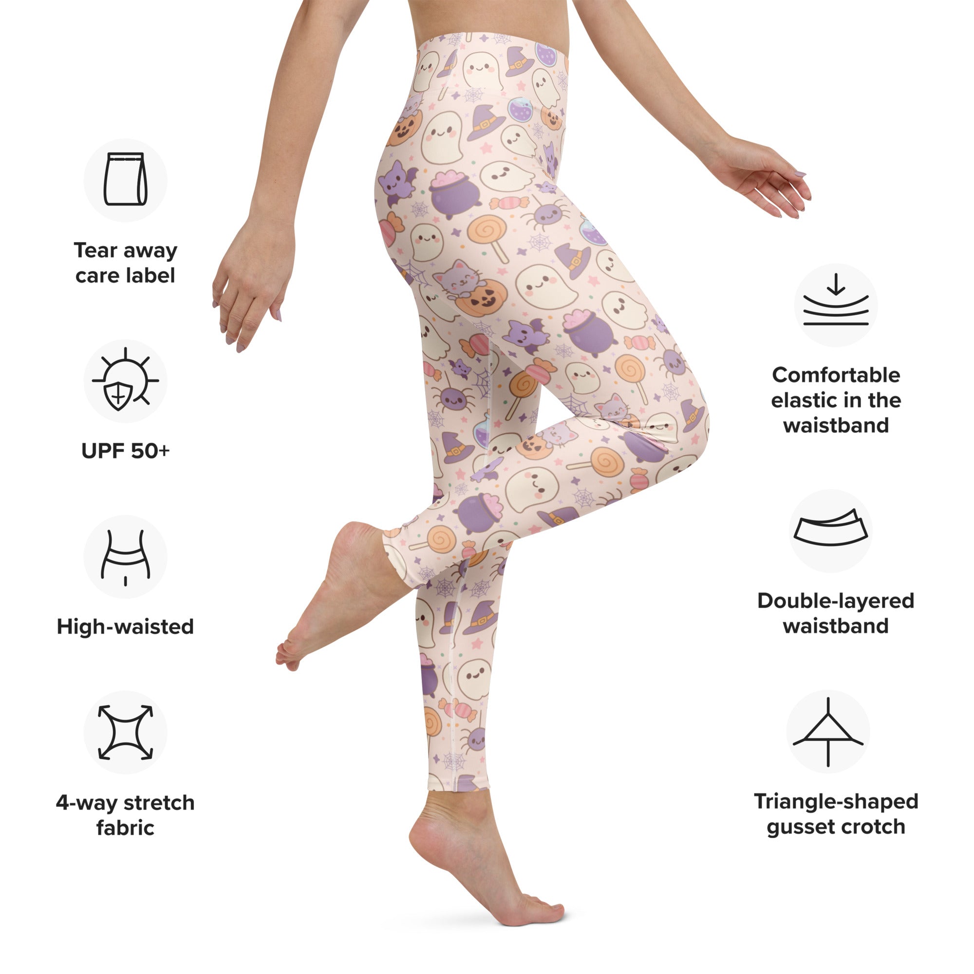 Women’s pastel pink buttery soft yoga leggings with playful halloween ghosts cats and candy pattern