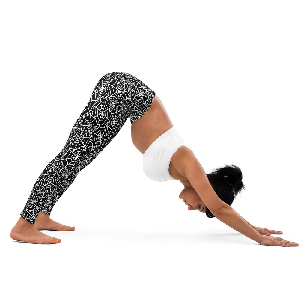 Black women’s buttery soft yoga leggings with white spiderweb pattern perfect for halloween wear