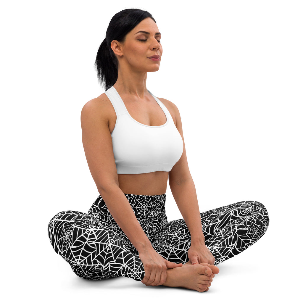 Women’s buttery soft black and white spiderweb patterned yoga leggings for halloween use