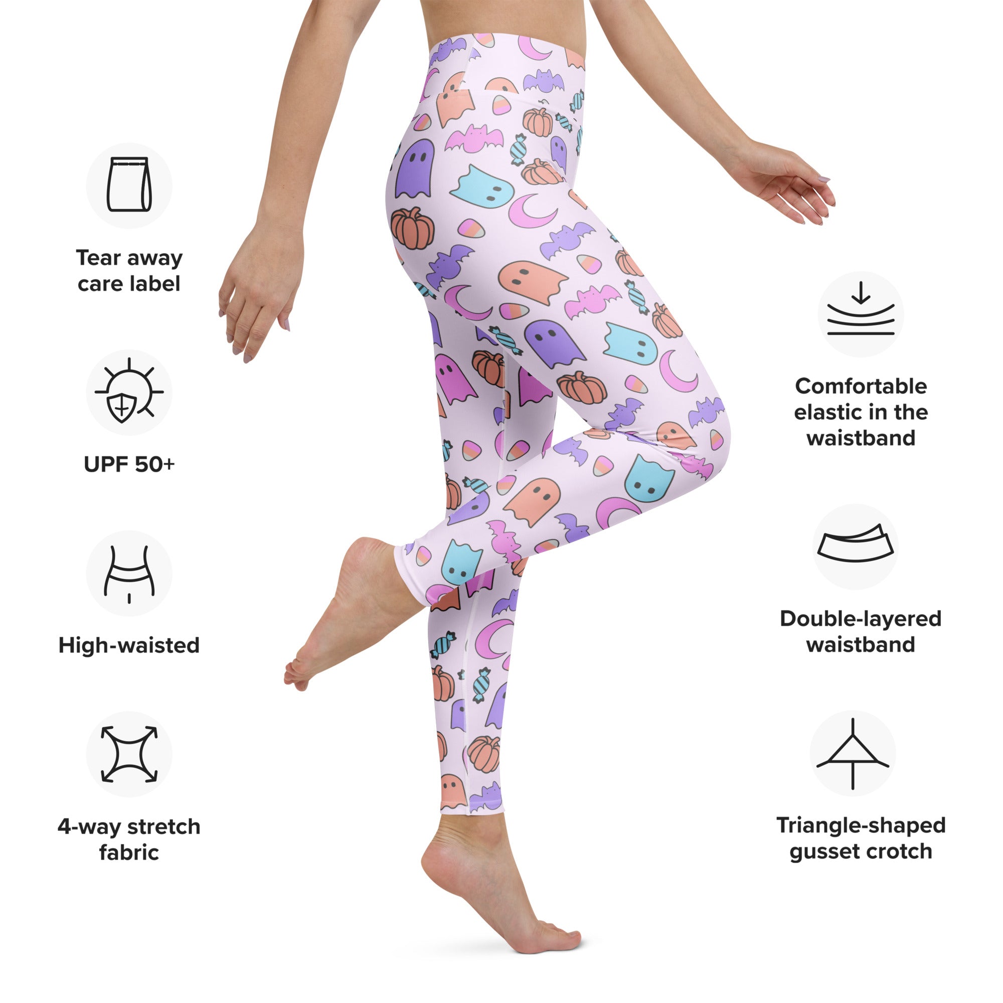 Women’s white buttery soft yoga leggings with pastel halloween ghosts bats pumpkins and moons playful pattern