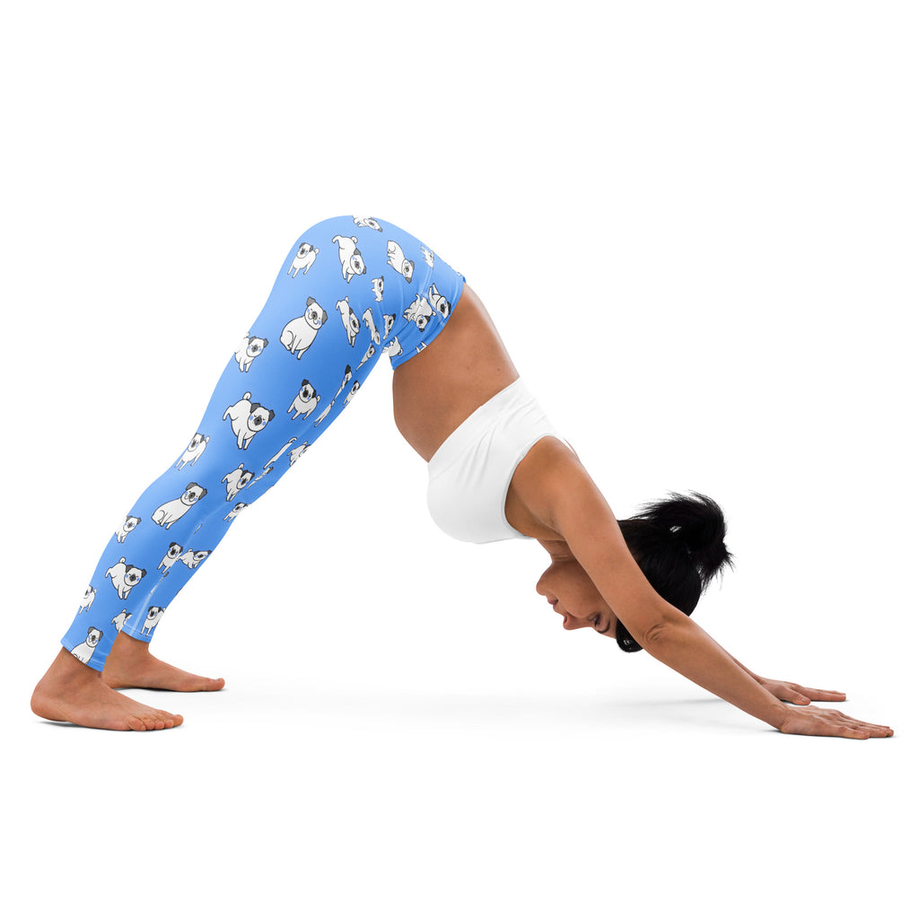 Women’s blue buttery soft yoga leggings with a playful pattern of white pug illustrations