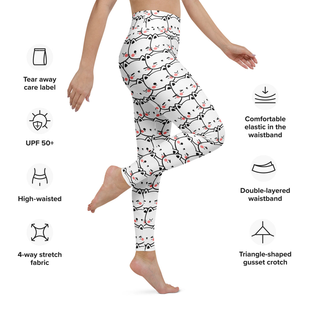White buttery soft women’s yoga leggings with a playful black outlined cartoon cat pattern and pink blush cheeks
