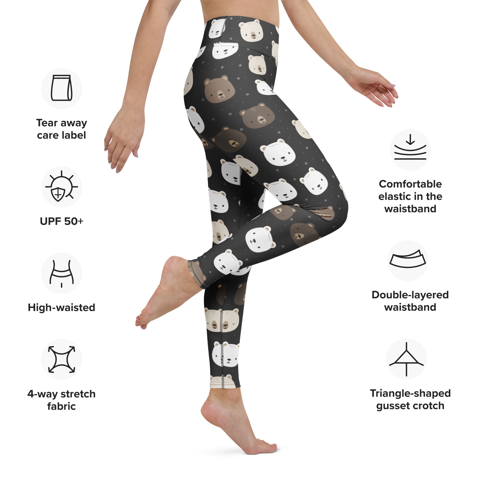 Black high waisted buttery soft yoga leggings with a playful brown and white bear face pattern on a dark background
