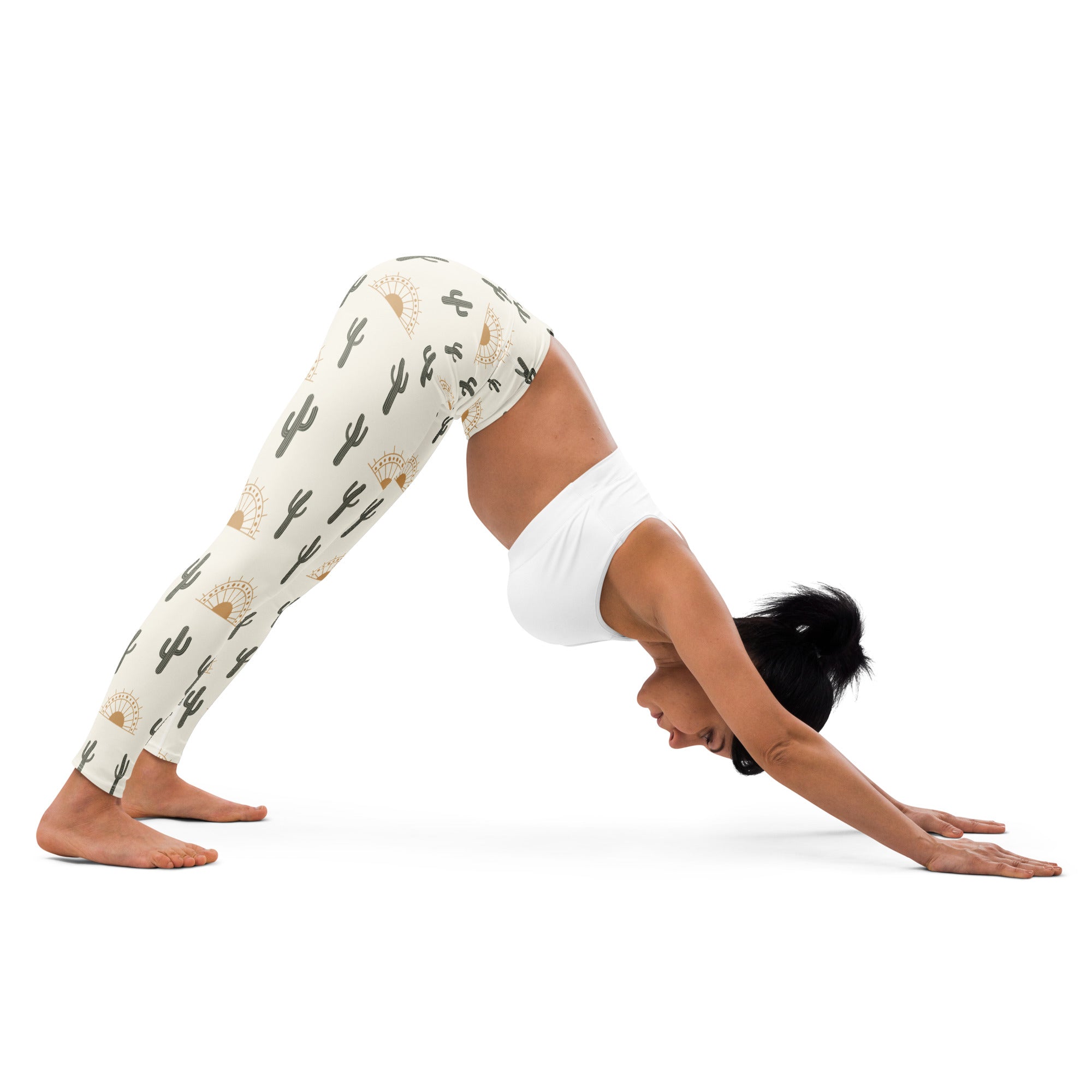 Women’s cream-colored buttery soft yoga leggings with black cactus and gold sun patterns for desert sunrise vibes