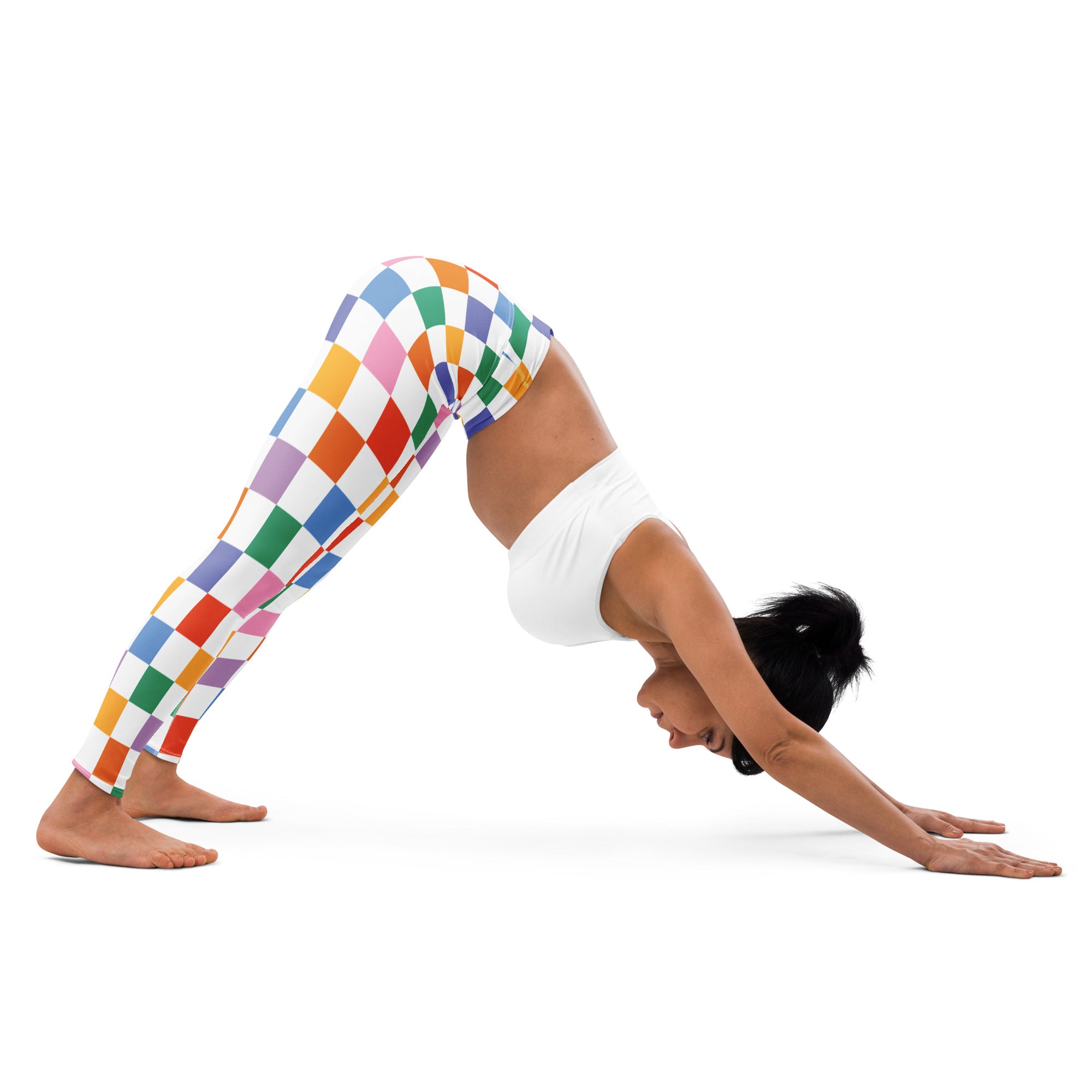 Vibrant rainbow checkered women’s yoga leggings with stretchy buttery soft fabric and form-fitting design