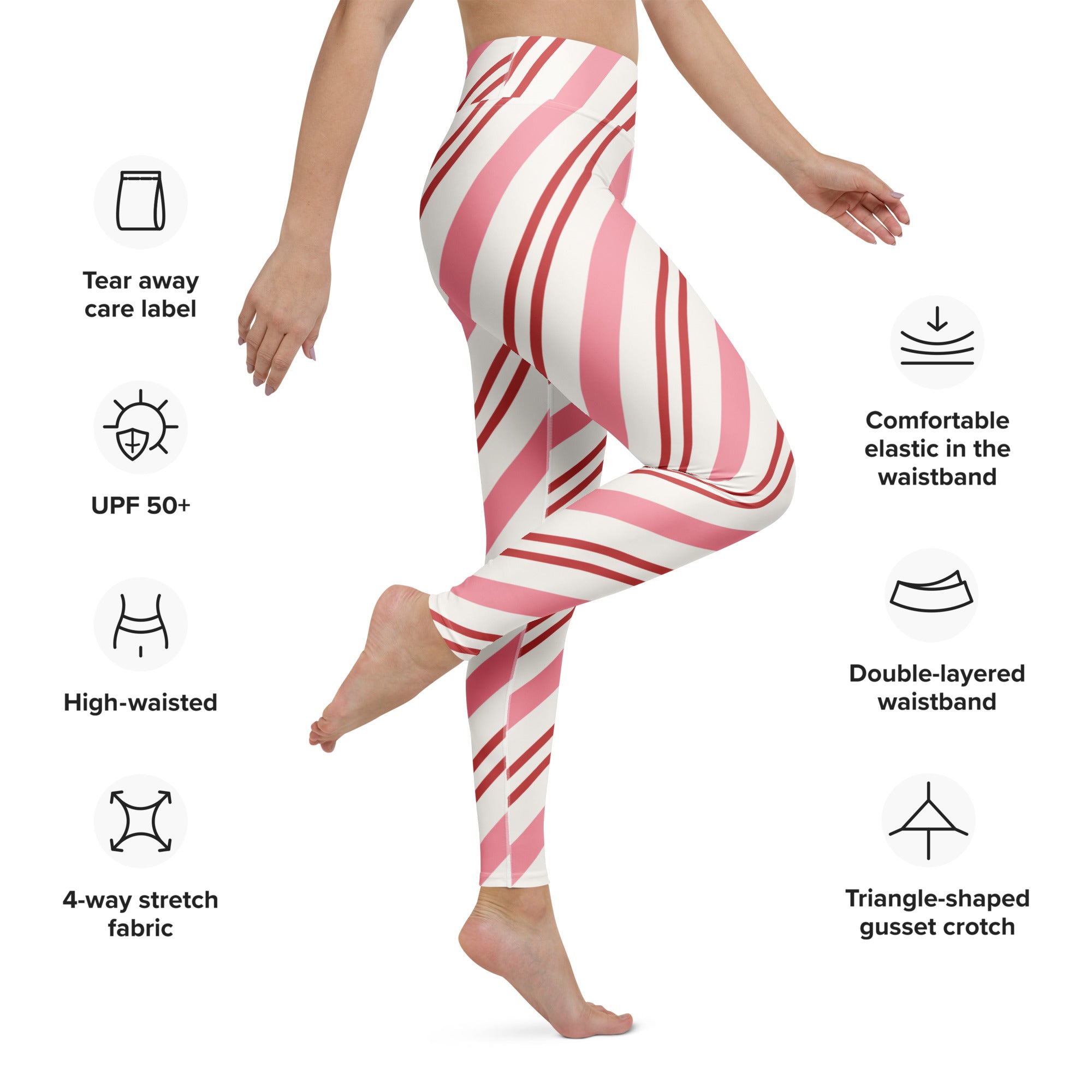Women’s candy cane stripe buttery soft yoga leggings in pink and white high-waisted 4-way stretch fabric