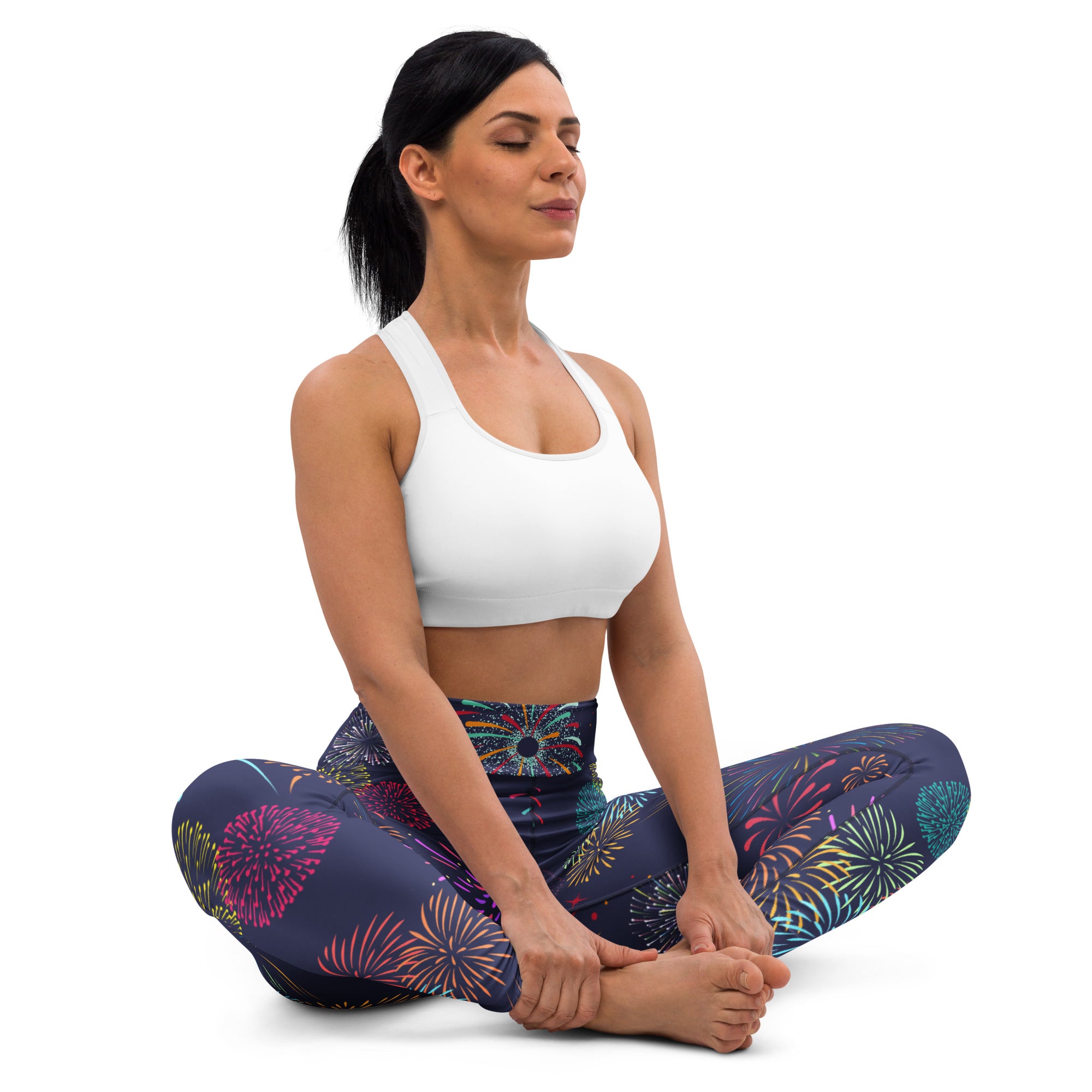 Dark blue women’s buttery soft yoga leggings with vibrant multicolored fireworks pattern