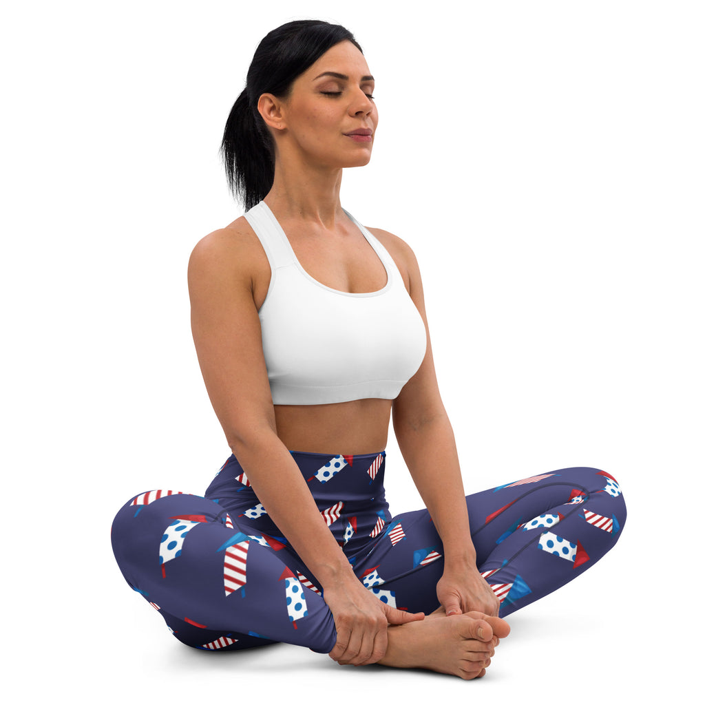 Navy blue buttery soft women’s yoga leggings with red and white soccer ball patterns for 4th of July flare