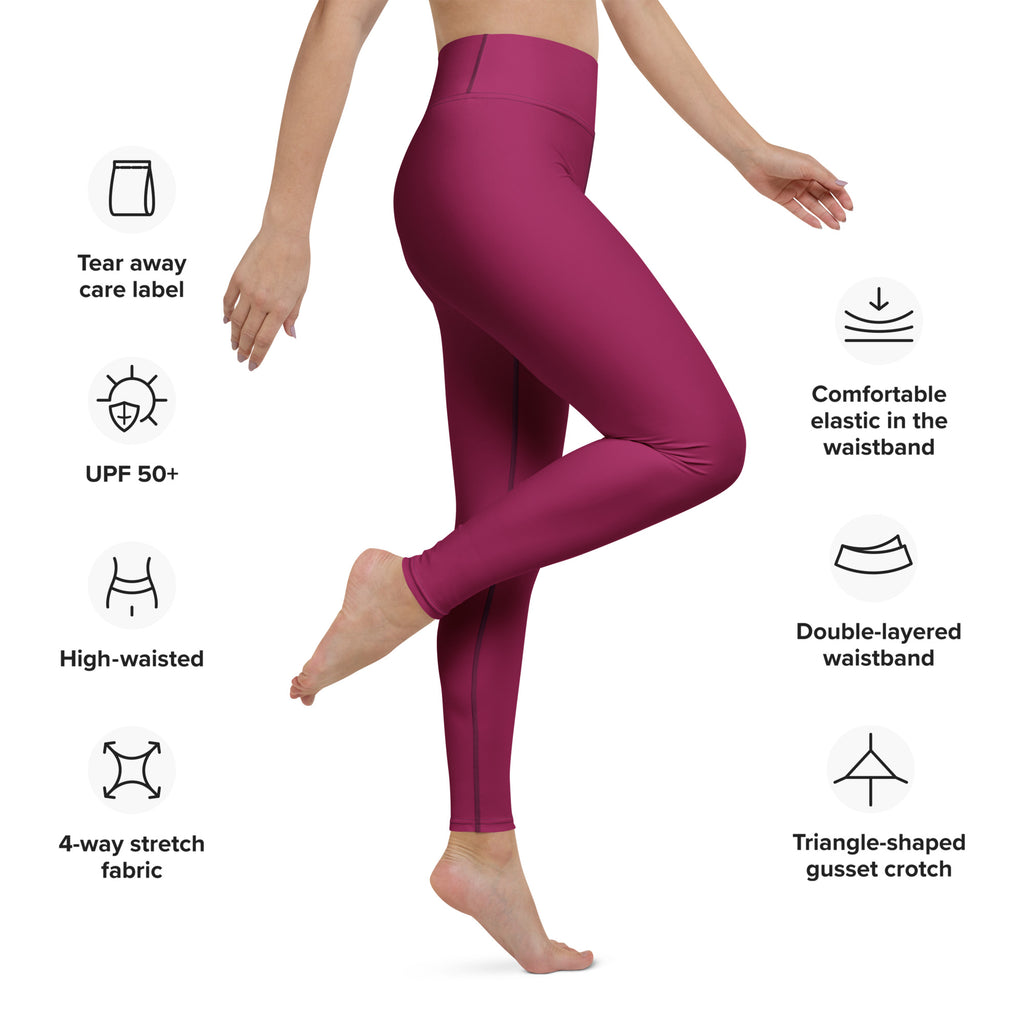 A pair of women’s dark magenta buttery soft yoga leggings with high-waisted 4-way stretch fabric and double waistband
