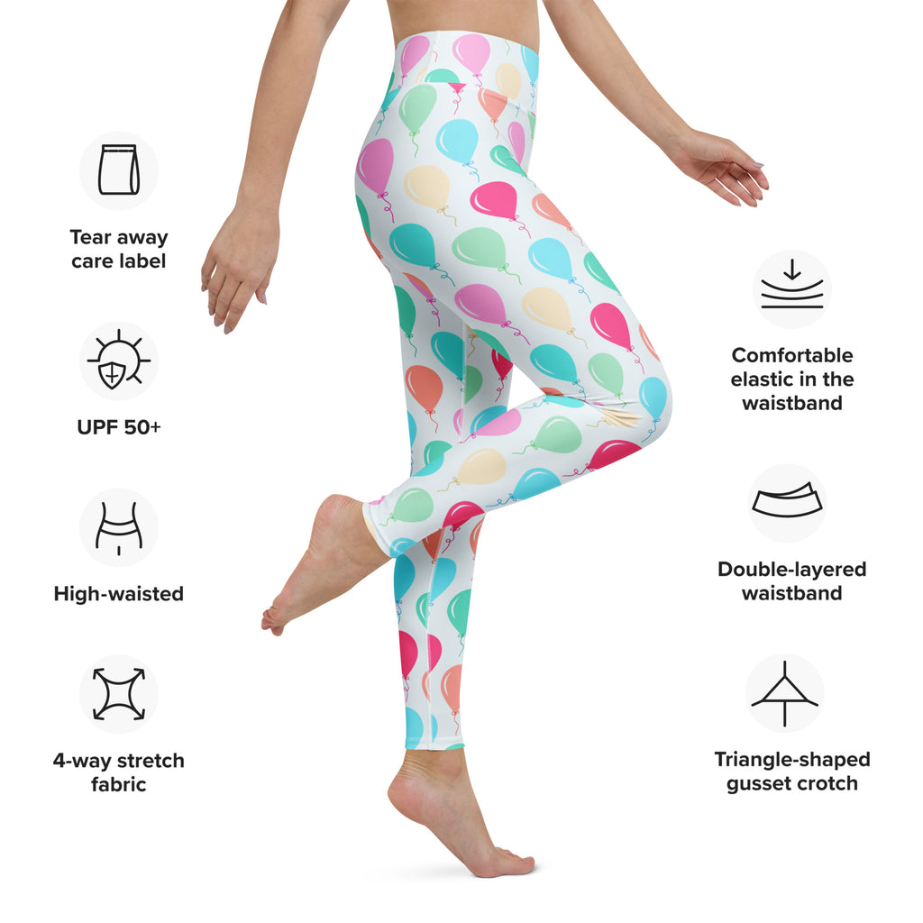White buttery soft yoga leggings with a playful colorful birthday balloon pattern in pink teal and pastel shades