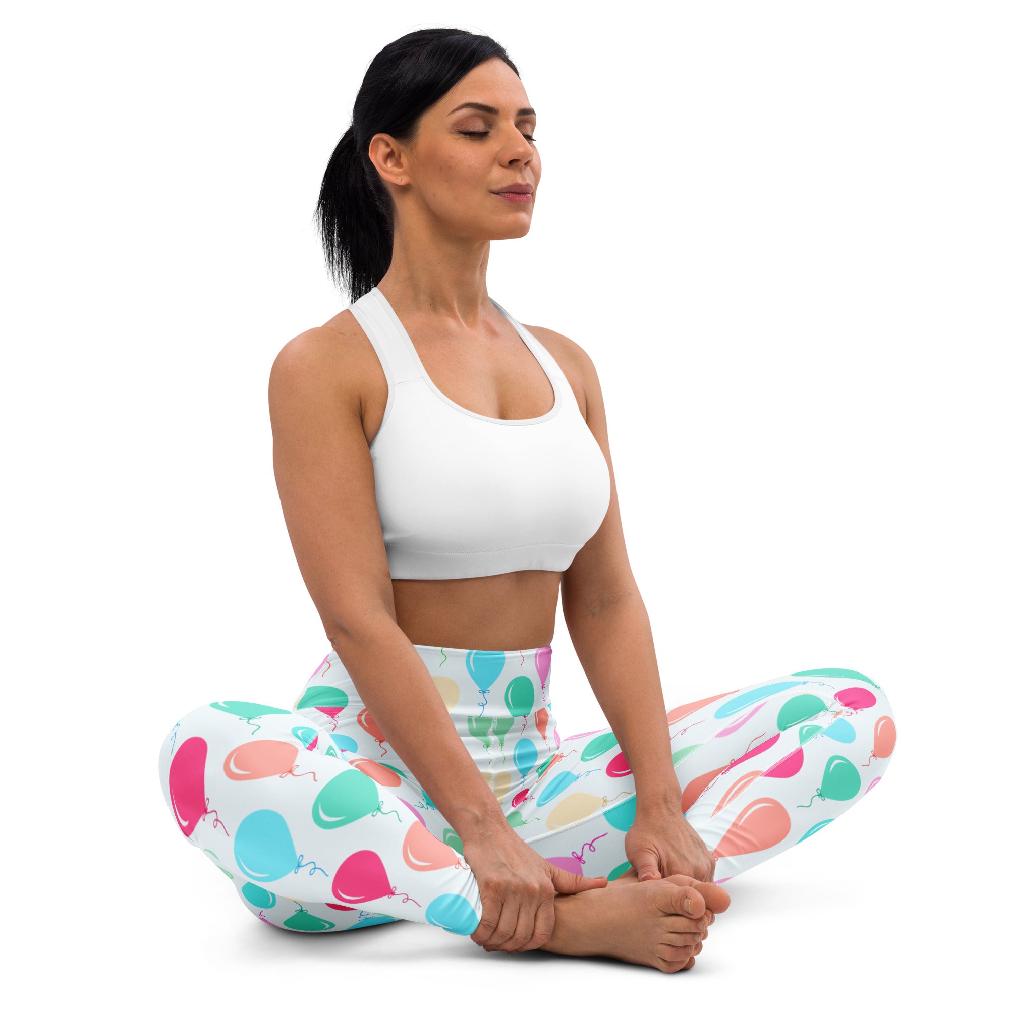 White sports bra with simple supportive design and soft fabric paired with colorful birthday balloons buttery soft yoga leggings
