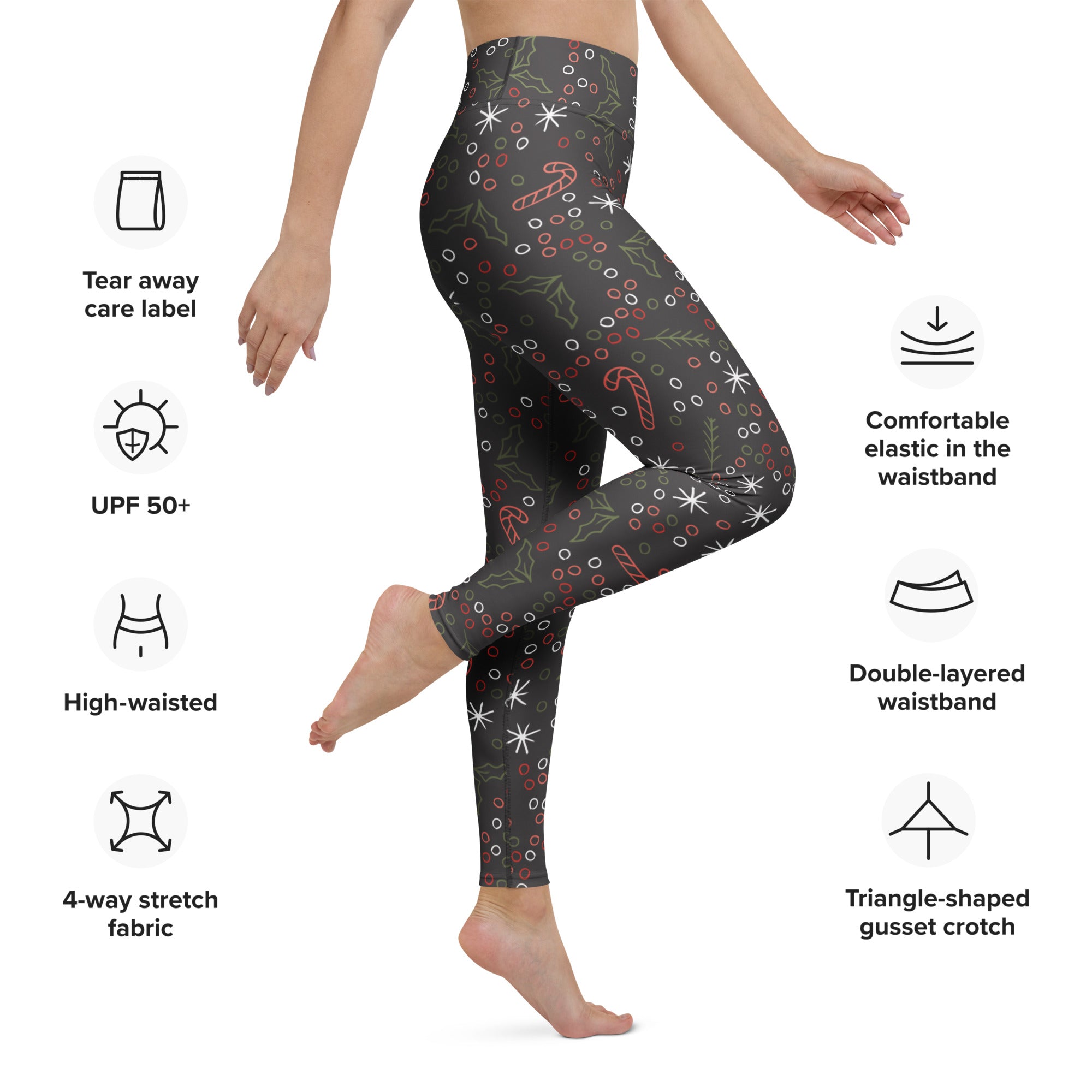 Women’s dark gray buttery soft yoga leggings with festive candy cane snowflake and holly holiday pattern