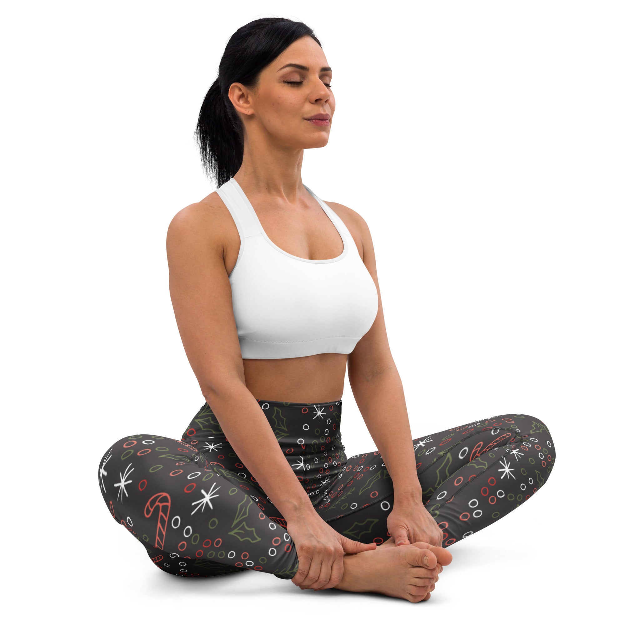 Women’s dark gray buttery soft yoga leggings with festive candy cane snowflake and holly holiday patterns