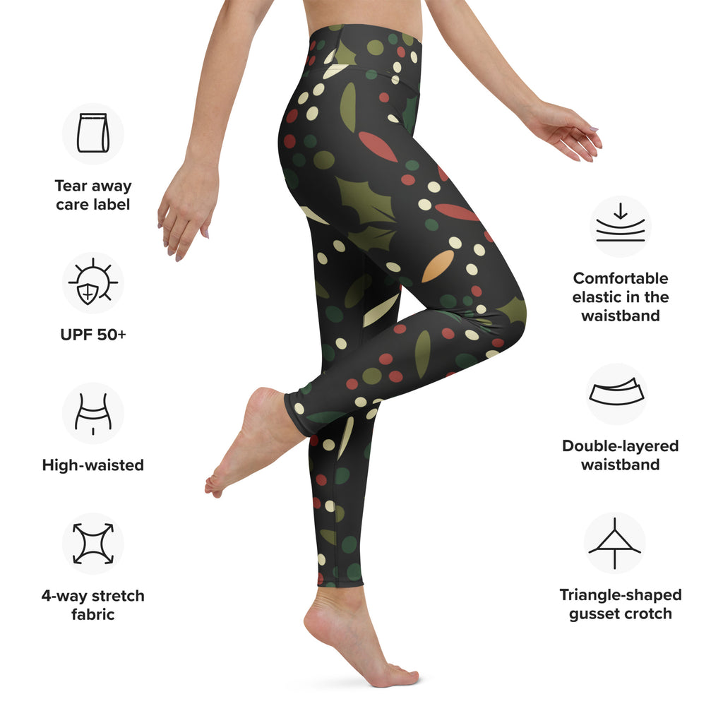 Women’s black high-waisted buttery soft yoga leggings with festive holly leaves red berries and multicolored polka dots
