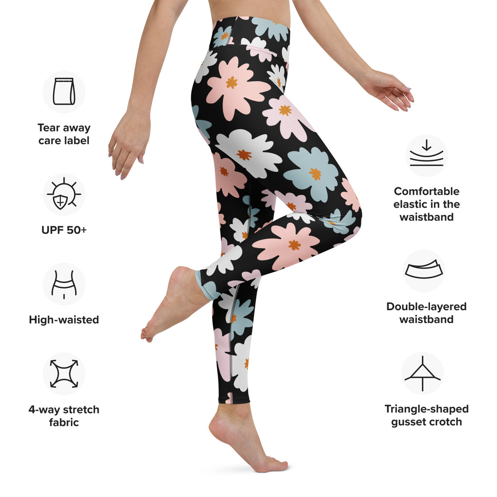 Black high-waisted women’s yoga leggings with vibrant pink white and blue floral pattern and buttery soft fabric