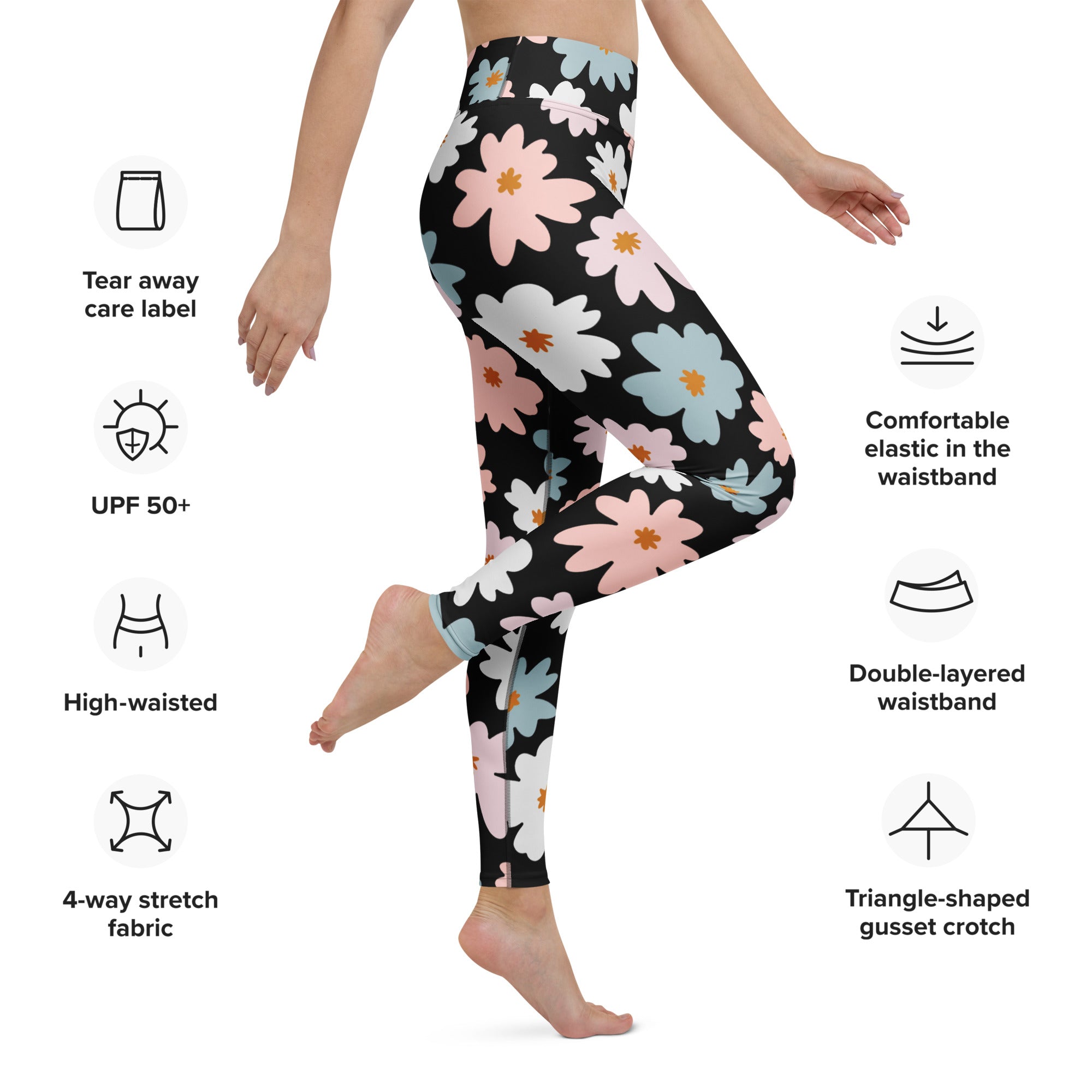 Black high-waisted women’s yoga leggings with vibrant pink white and blue floral pattern and buttery soft fabric