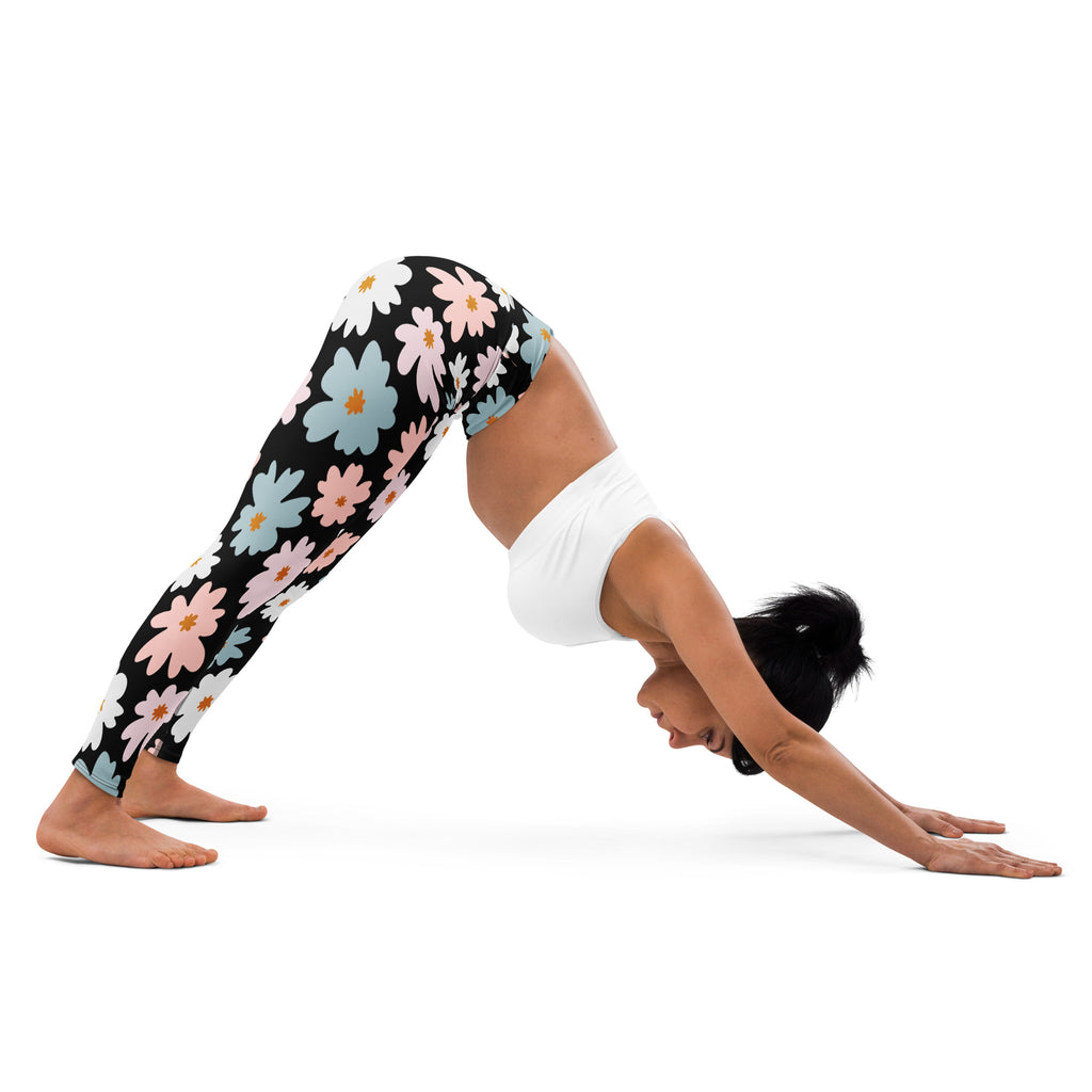 Black womens retro floral buttery soft yoga leggings with vibrant white pink and light blue daisy pattern