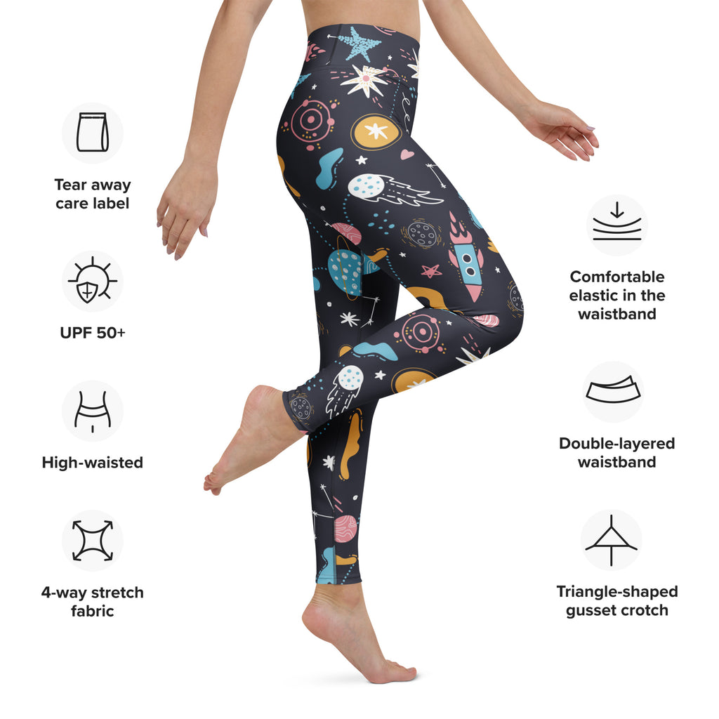 Women’s outer space buttery soft yoga leggings in dark navy with colorful cartoon planets rockets stars and moons