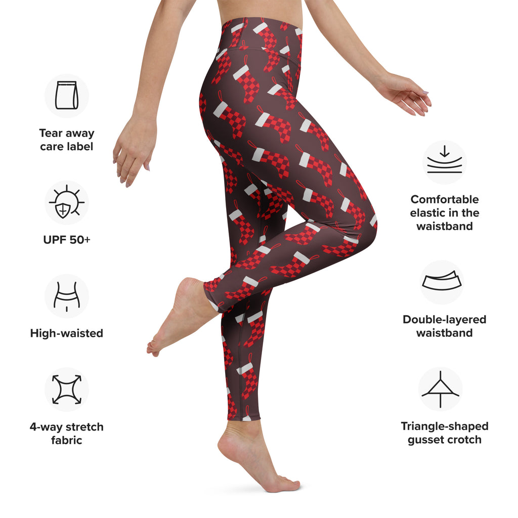 Women’s Christmas stocking buttery soft high-waisted leggings in red and white checkered pattern on dark brown background