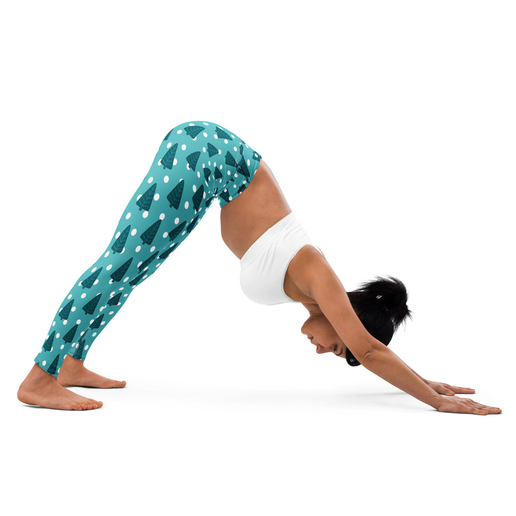Women’s teal winter tree buttery soft yoga leggings with dark green pine tree and white polka dot pattern