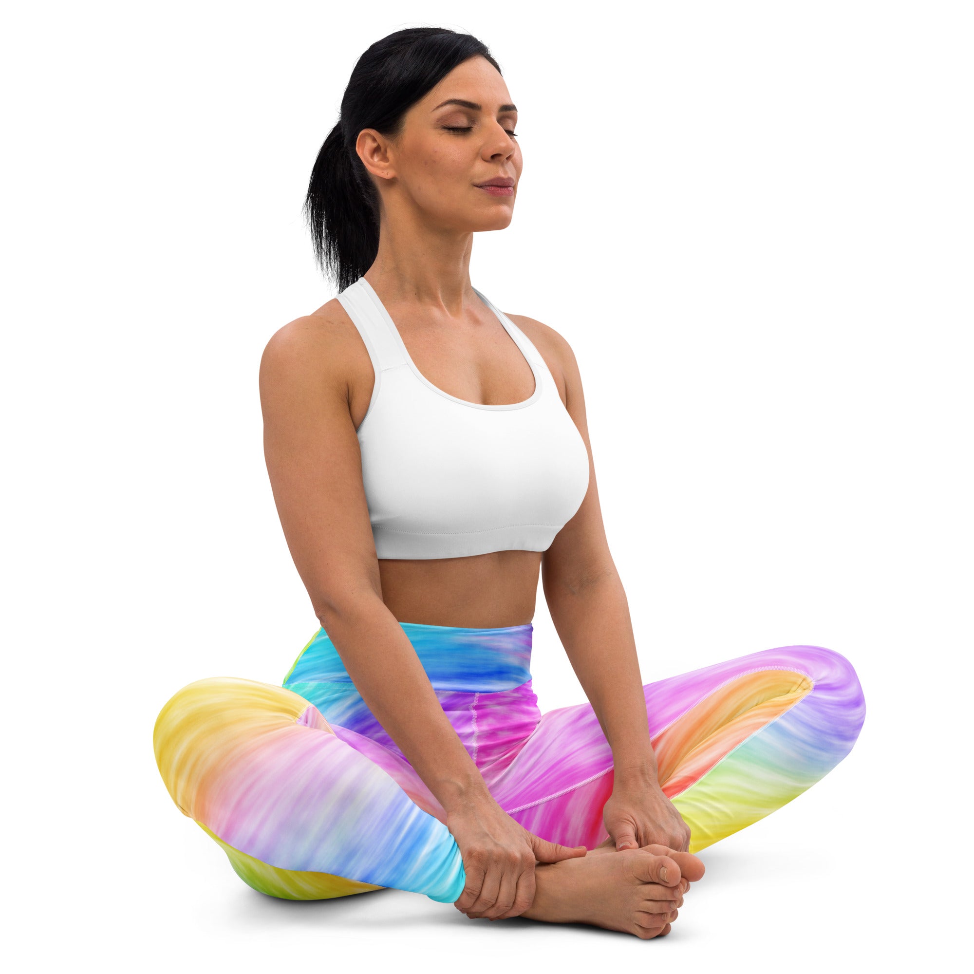 Women’s rainbow tie dye yoga leggings in a vibrant yellow to purple gradient with high waisted soft stretch fabric