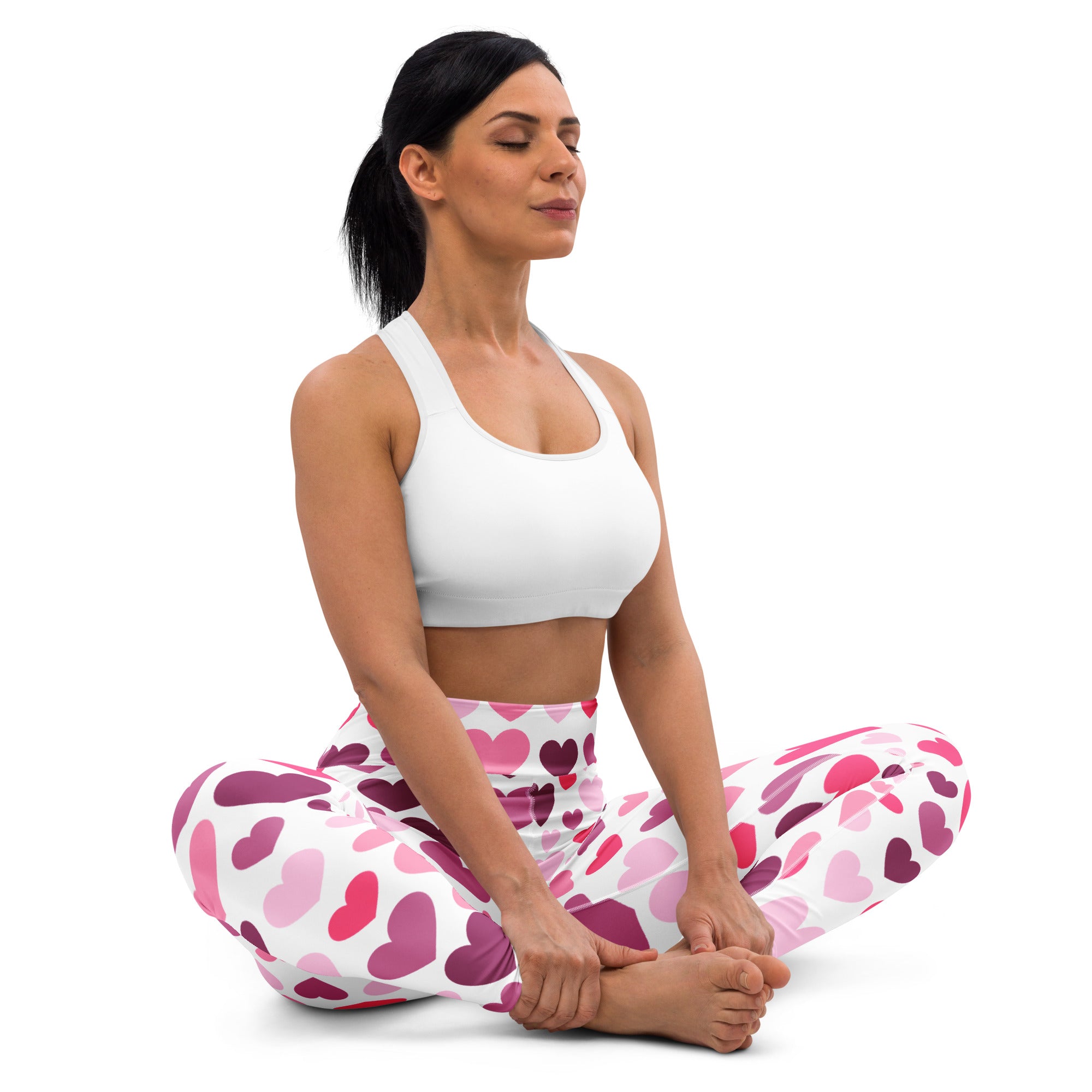 Women’s pink and white heart patterned buttery soft high waisted yoga leggings with quick drying fabric